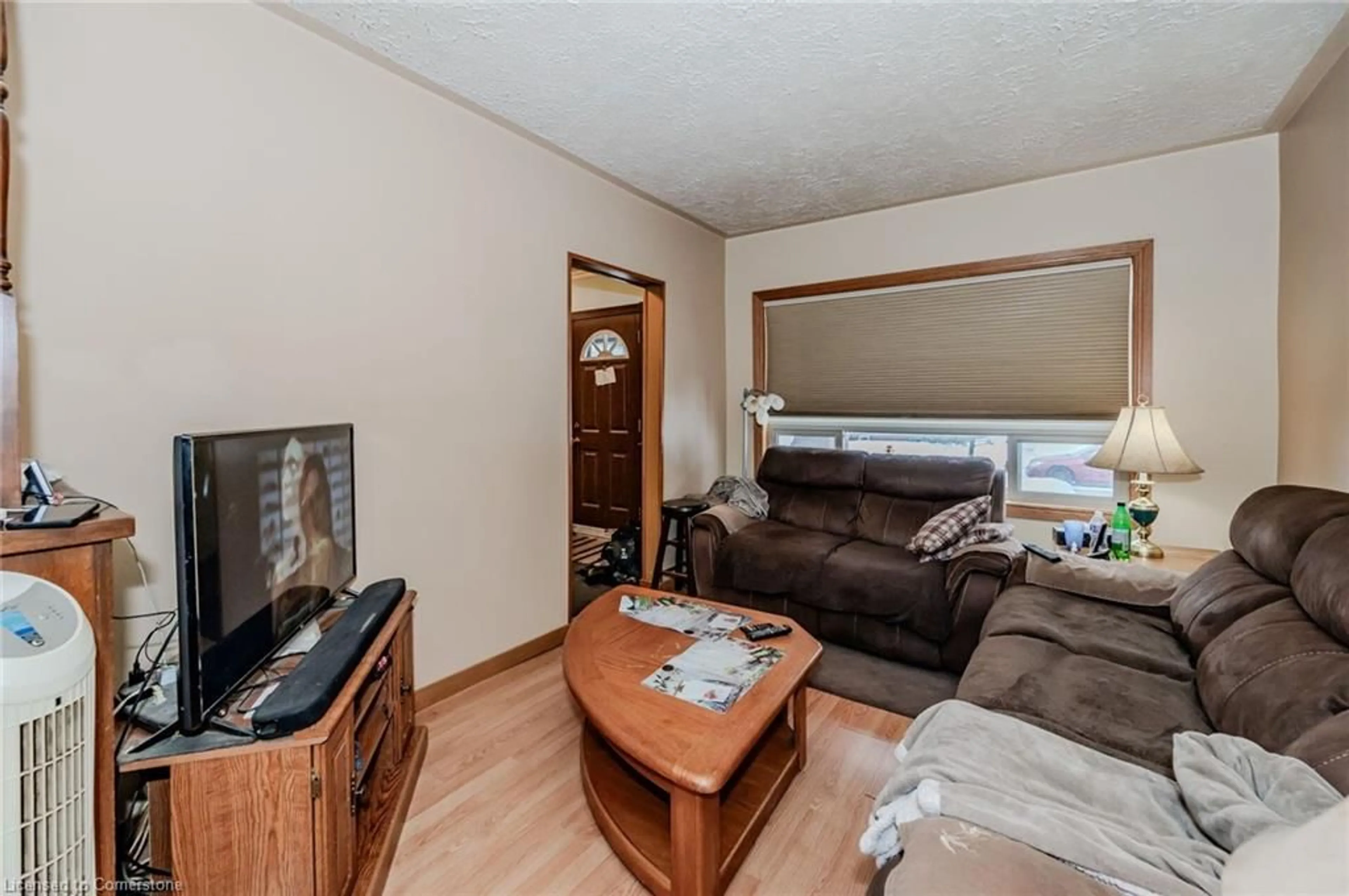 Living room with furniture, wood/laminate floor for 6 Herlan Ave, Kitchener Ontario N2G 4K3