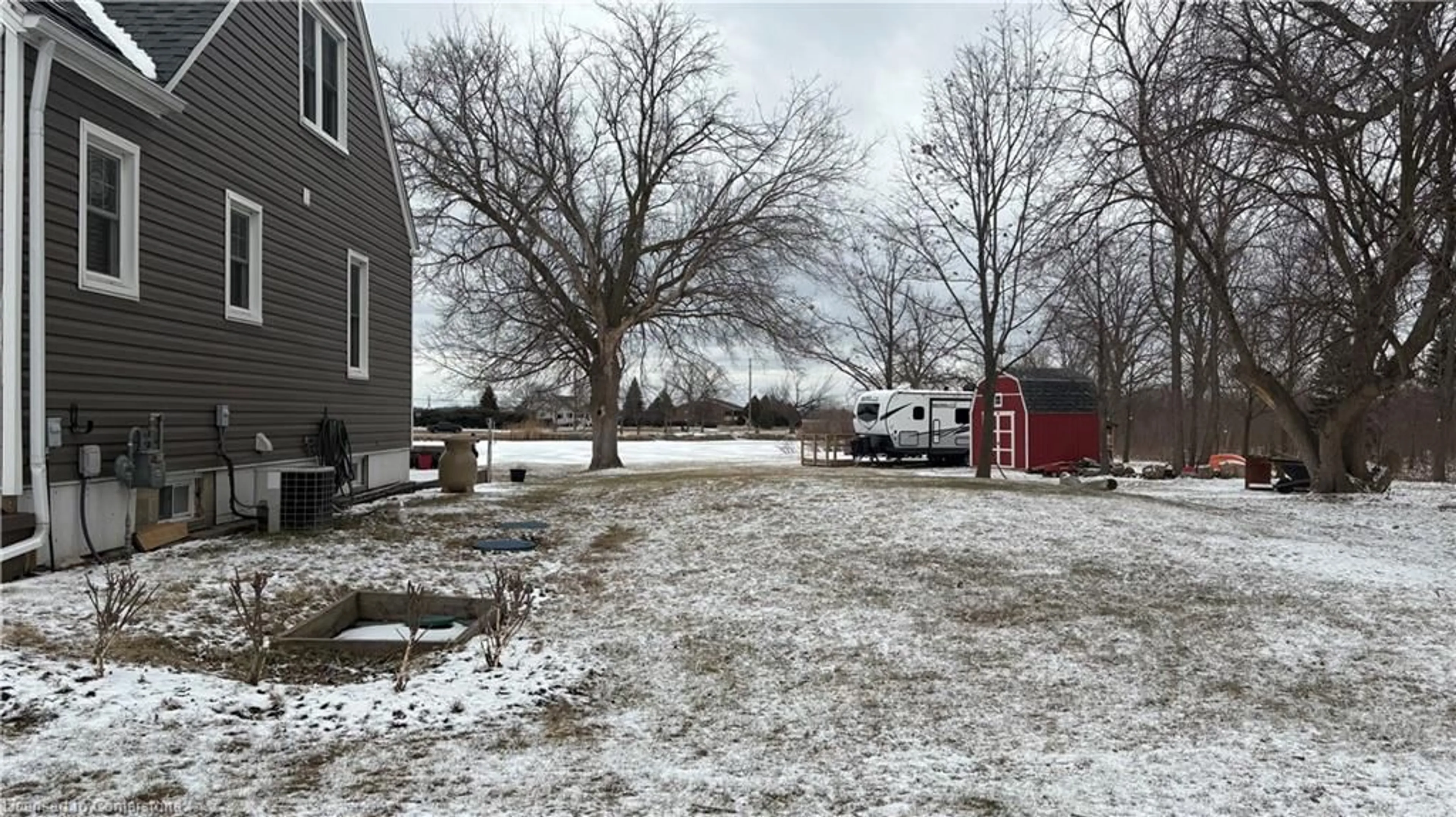 A pic from outside/outdoor area/front of a property/back of a property/a pic from drone, street for 1550 North Townline Rd, LaSalle Ontario N9J 2W7