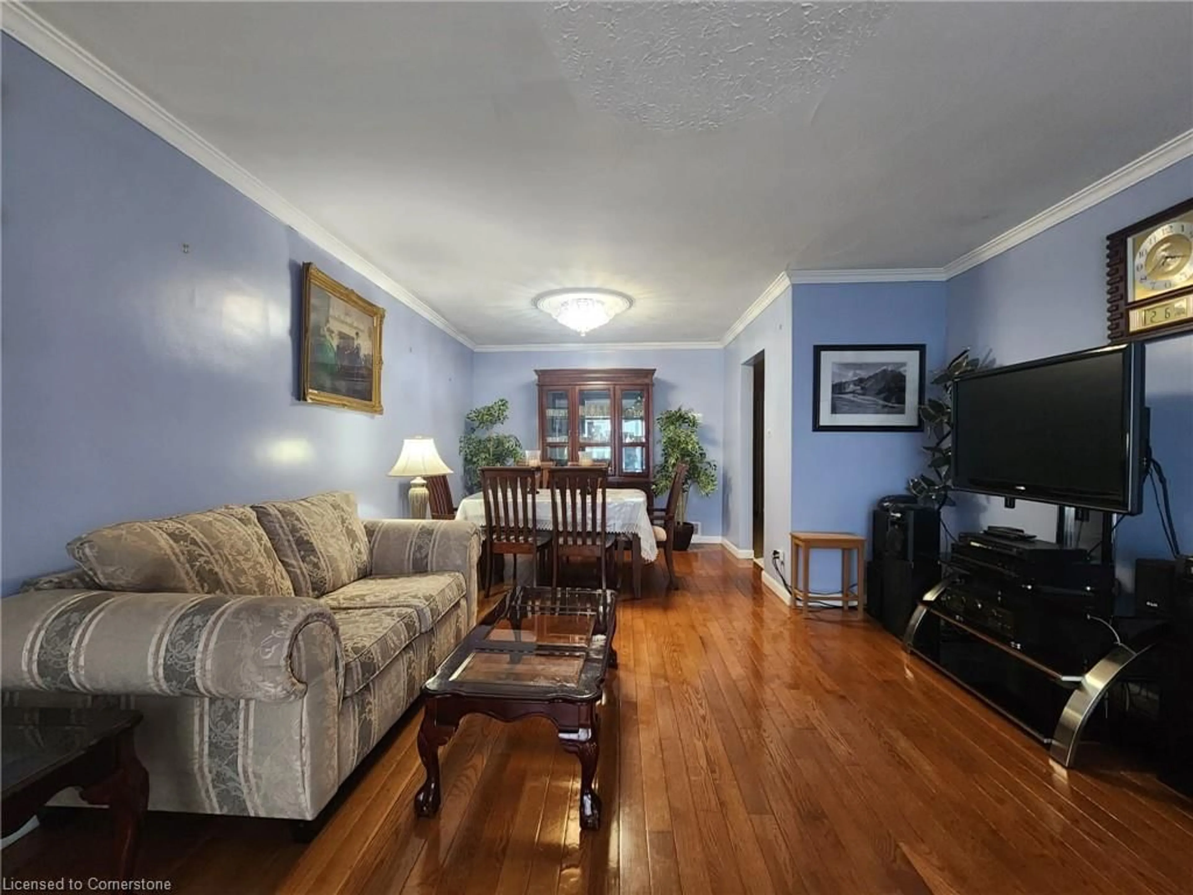 Living room with furniture, wood/laminate floor for 55 Firgrove Cres, Toronto Ontario M3N 1K5