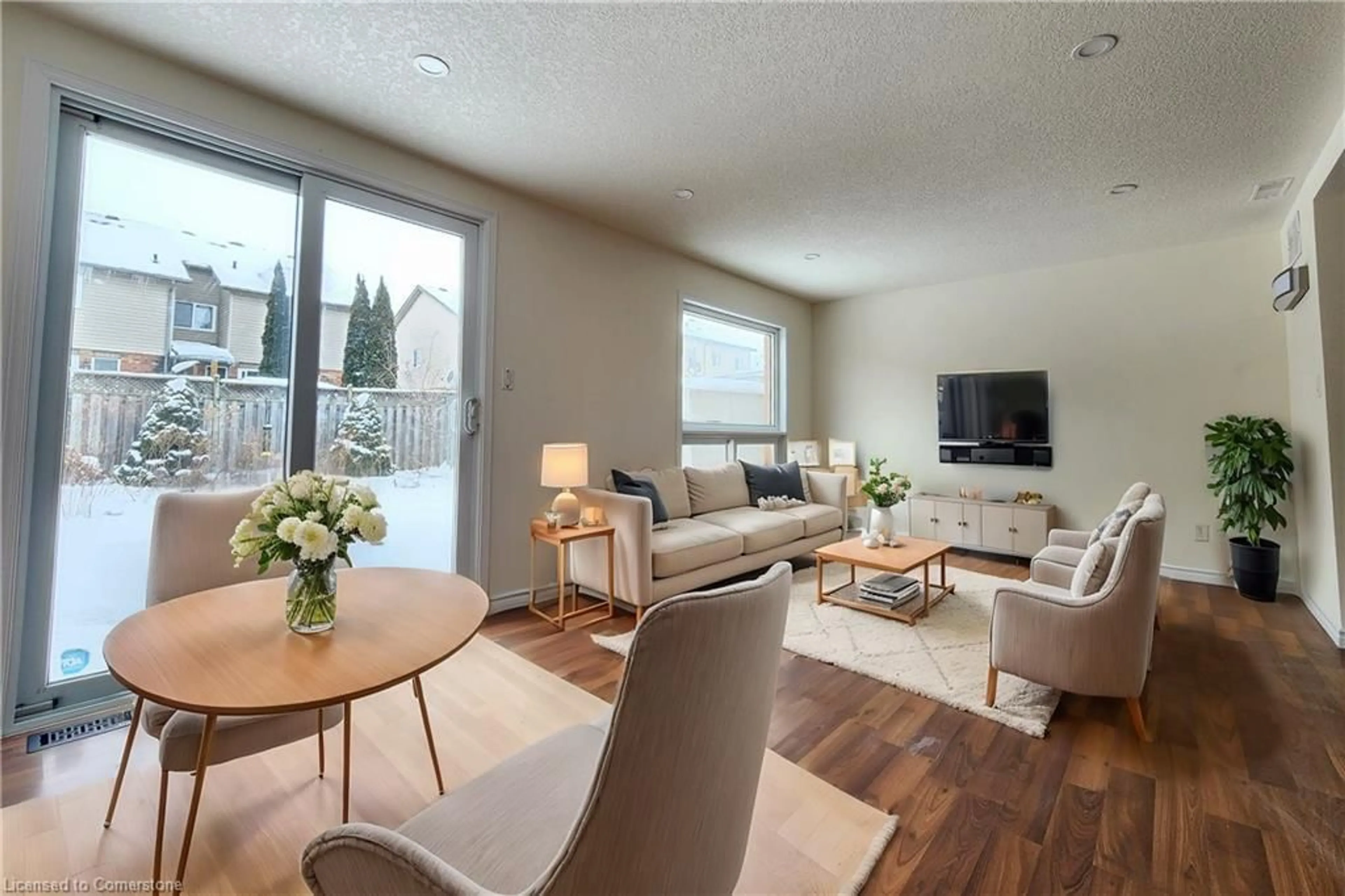 Living room with furniture, wood/laminate floor for 39 Bridlewreath St, Kitchener Ontario N2E 3V5