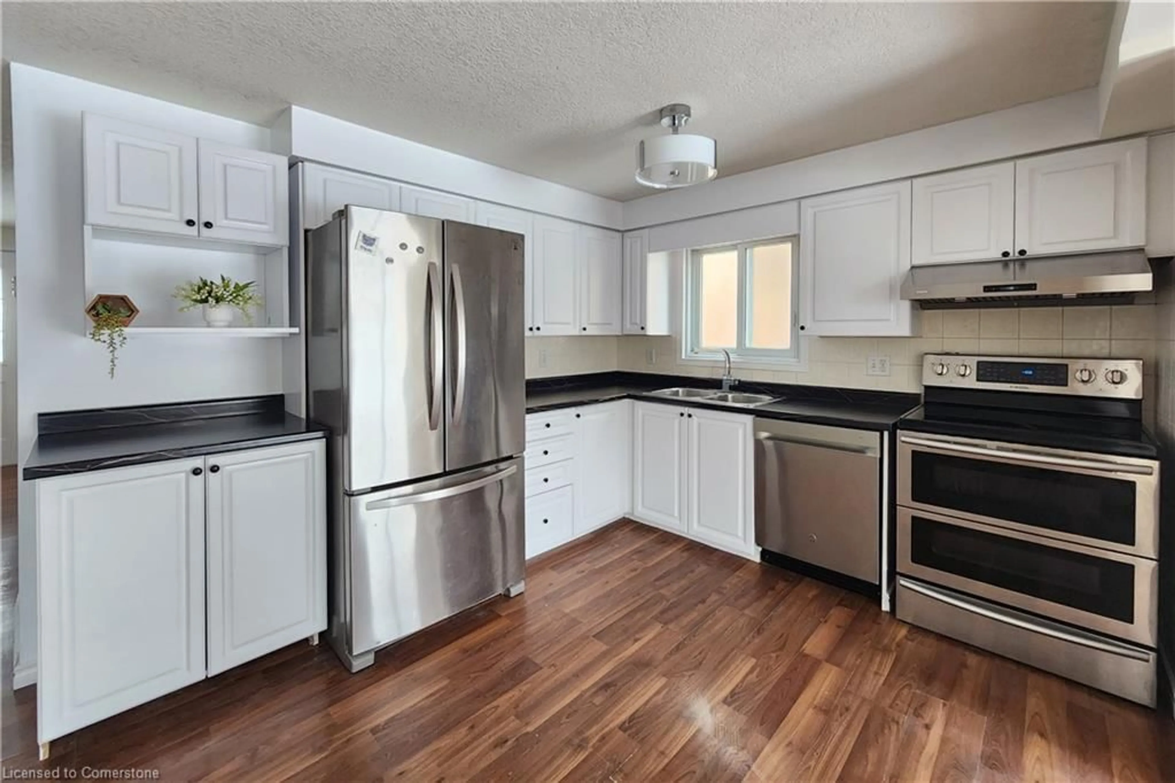 Open concept kitchen, unknown for 39 Bridlewreath St, Kitchener Ontario N2E 3V5