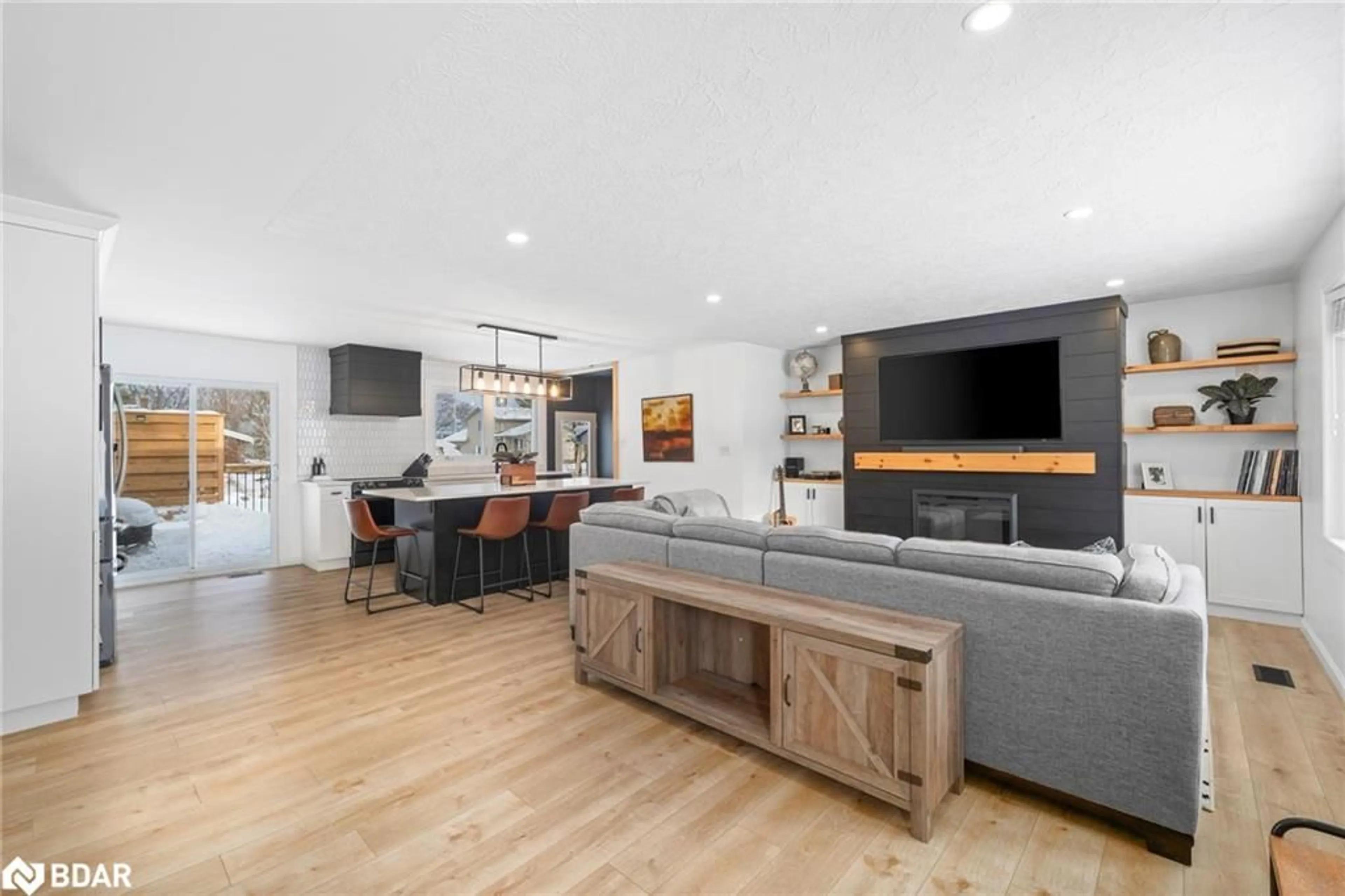 Open concept kitchen, wood/laminate floor for 18 Princess Dr, Carrying Place Ontario K0K 1L0