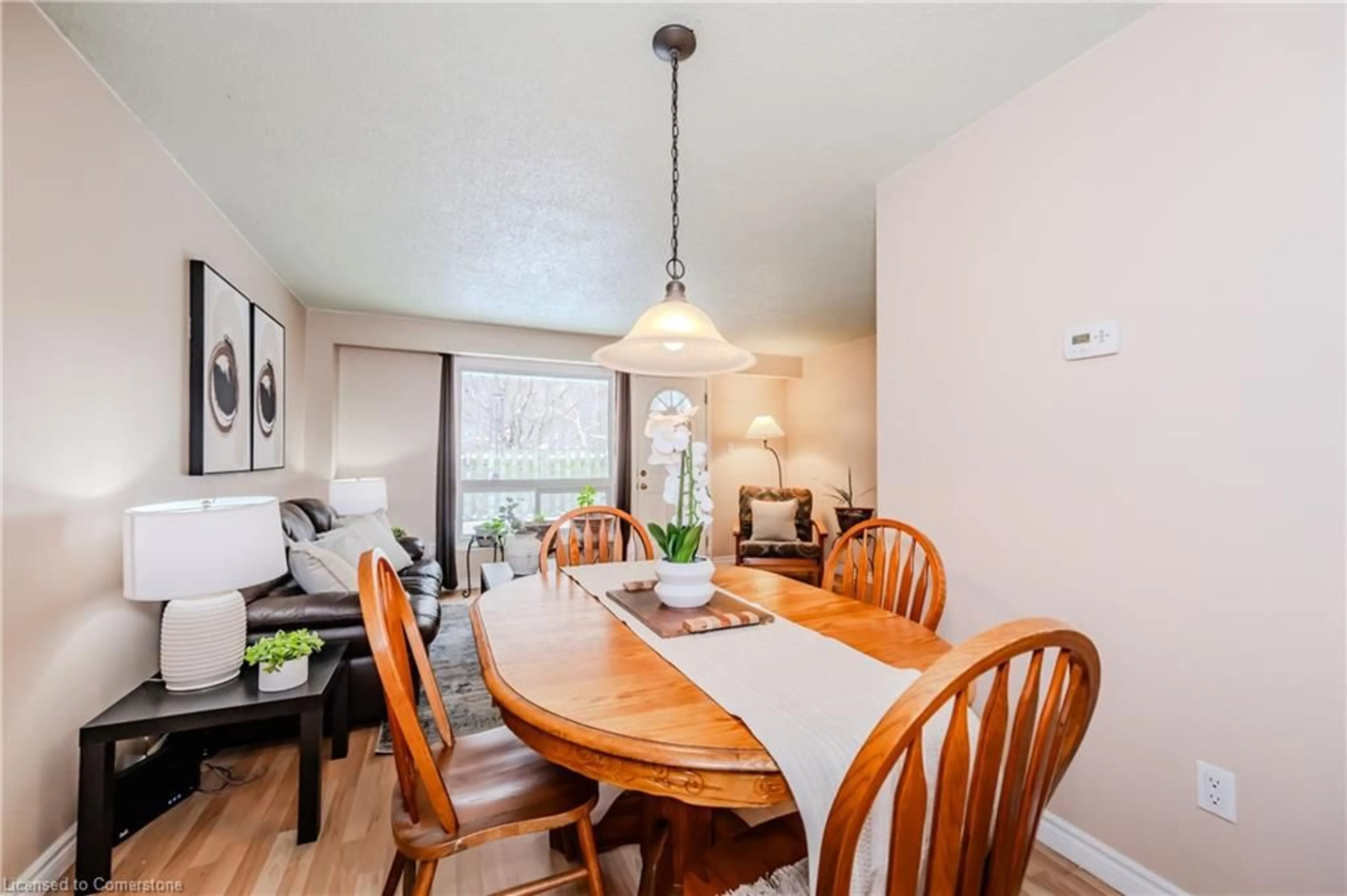 Dining room, wood/laminate floor for 165 Green Valley Dr #79, Kitchener Ontario N2P 1K3