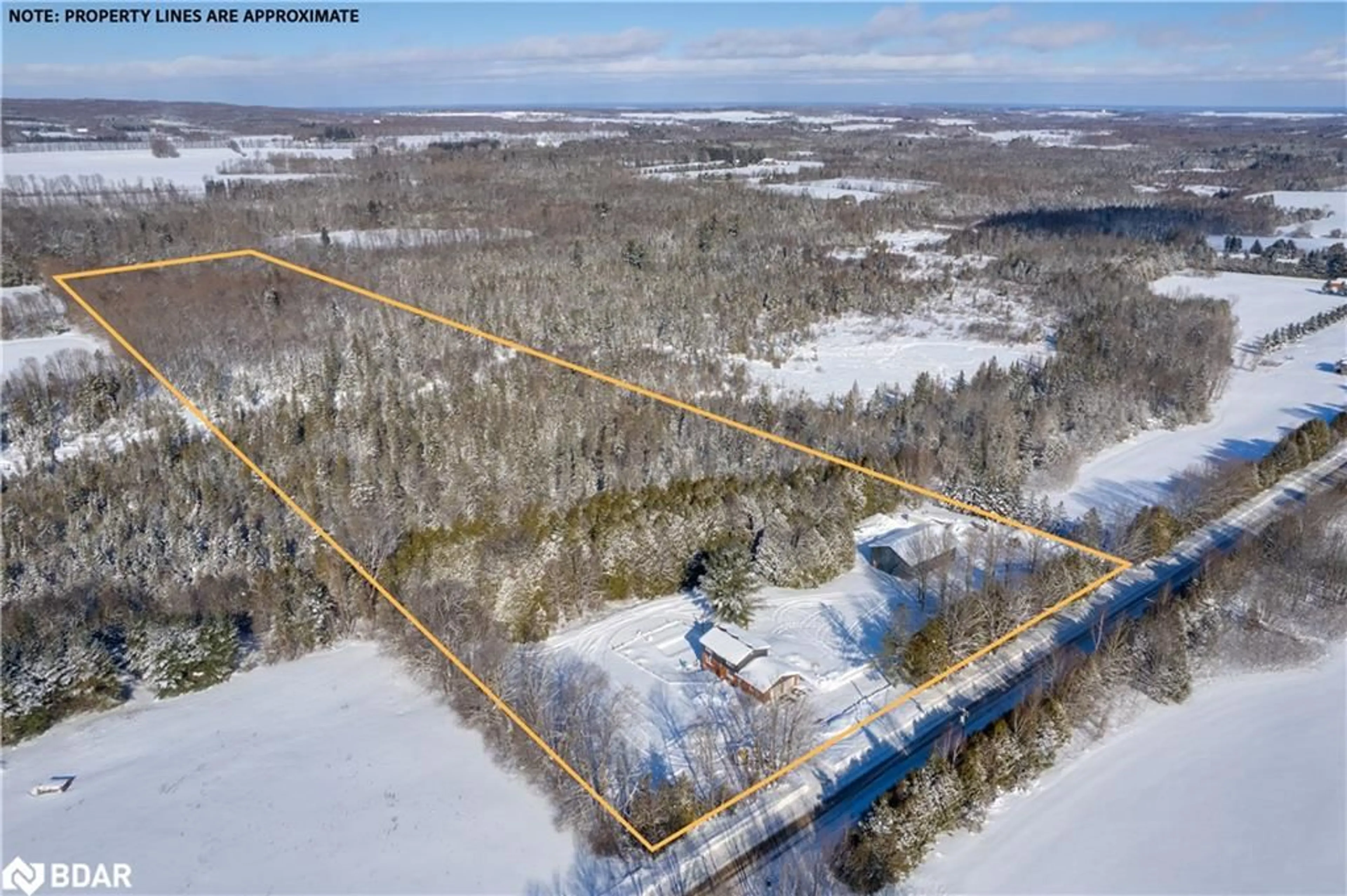 A pic from outside/outdoor area/front of a property/back of a property/a pic from drone, forest/trees view for 1384 15/16 Side Rd, Oro-Medonte Ontario L0L 1T0