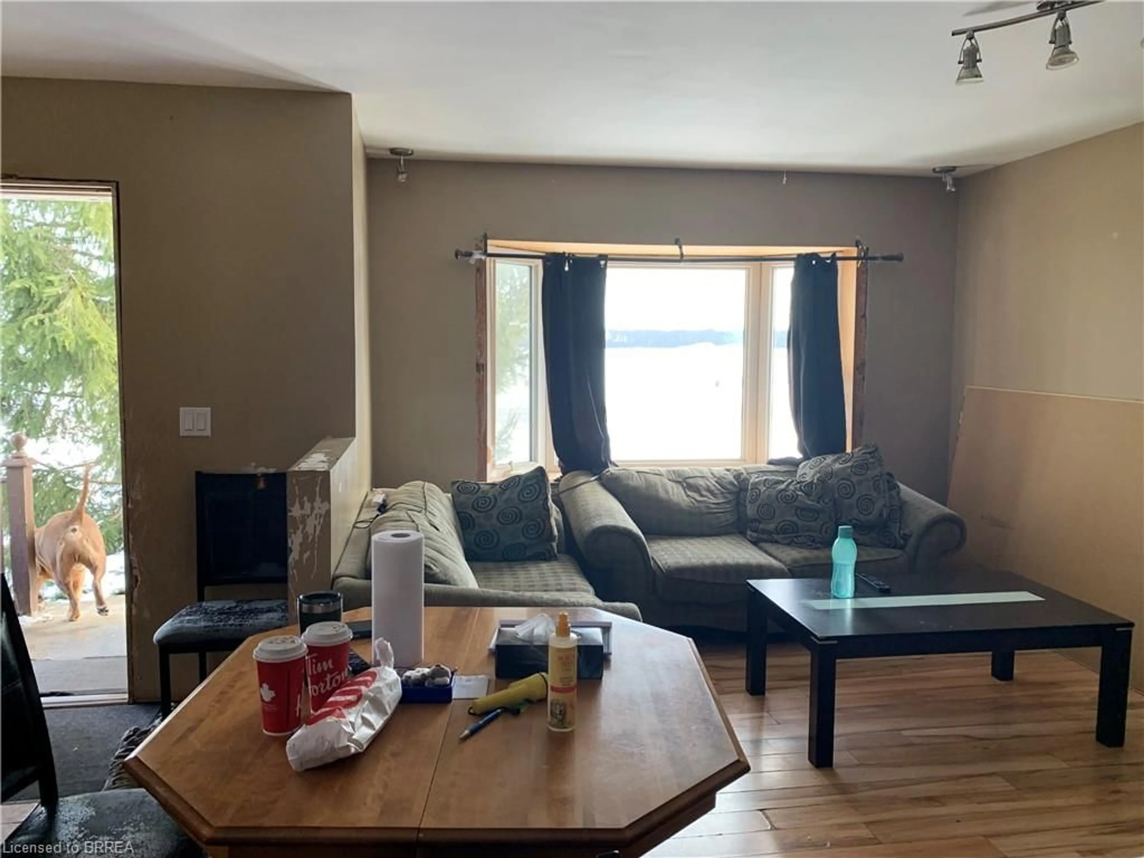 Living room with furniture, wood/laminate floor for 9125 Sodom Rd, Niagara Falls Ontario L2E 6S6