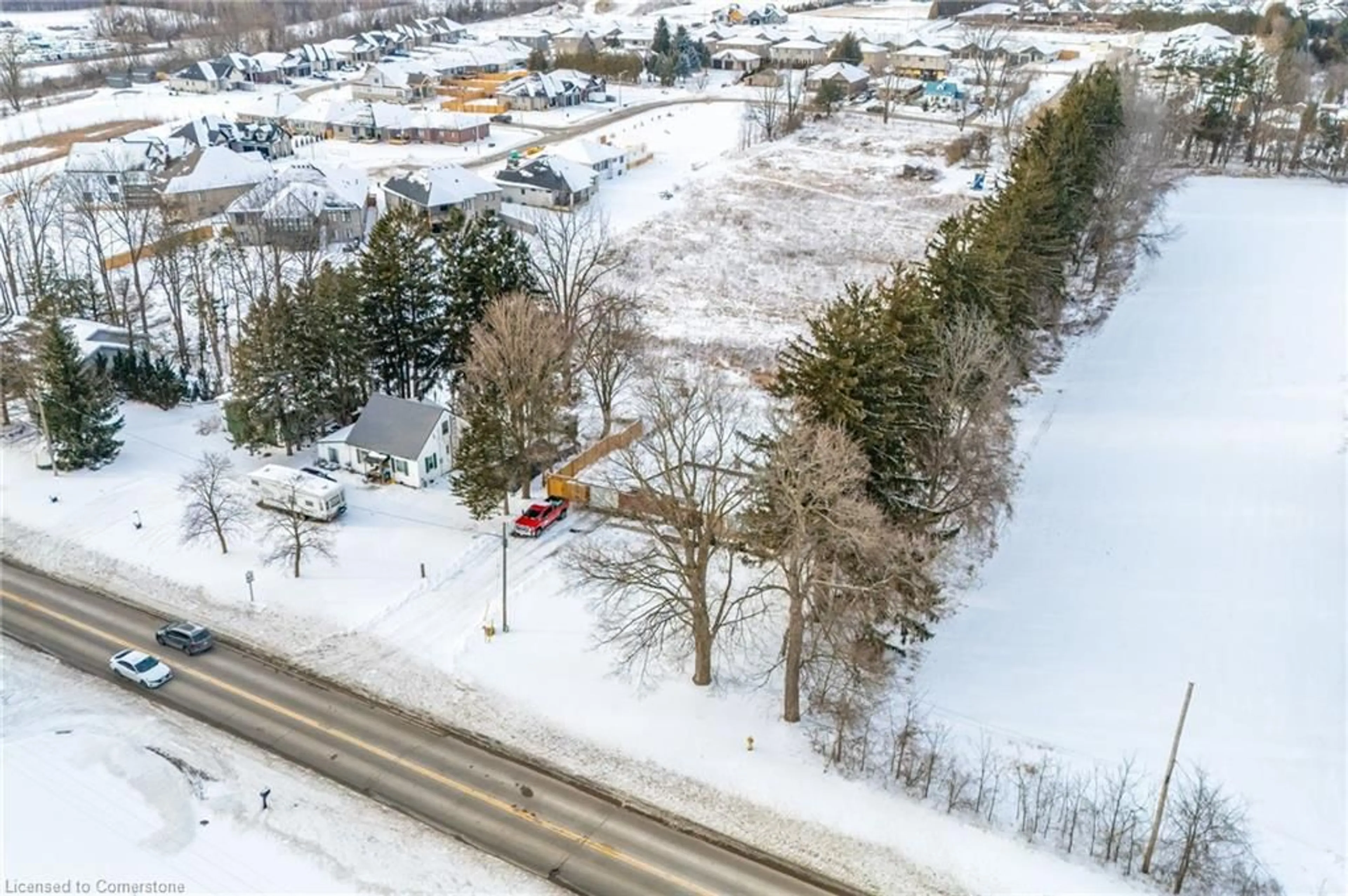 A pic from outside/outdoor area/front of a property/back of a property/a pic from drone, street for 211 Thompson Rd West Rd, Waterford Ontario N0E 1Y0