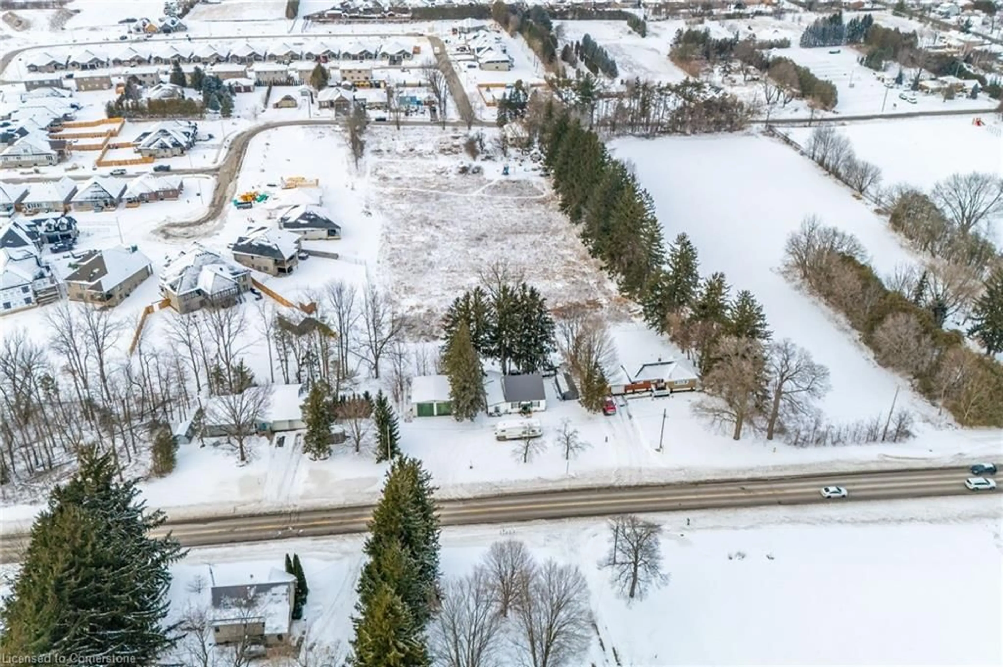 A pic from outside/outdoor area/front of a property/back of a property/a pic from drone, street for 211 Thompson Rd West Rd, Waterford Ontario N0E 1Y0