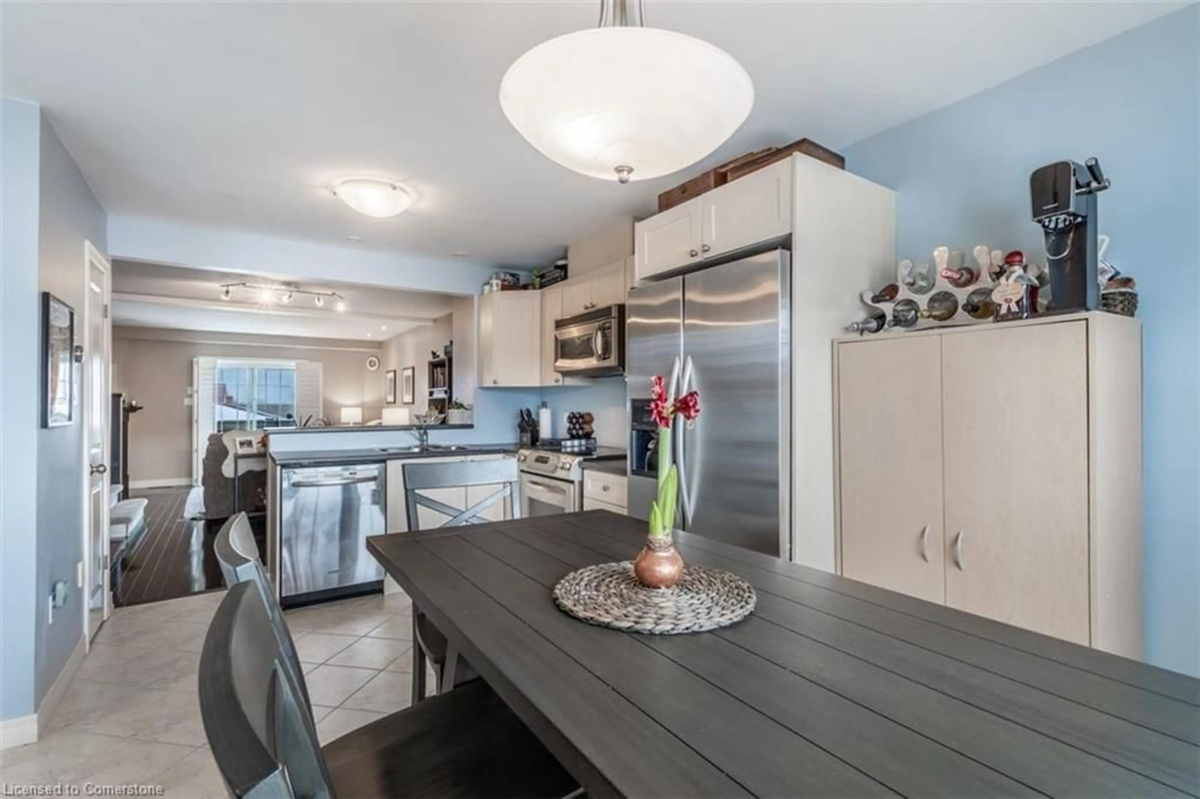 Open concept kitchen, wood/laminate floor for 437 Highway No. 8 #3, Stoney Creek Ontario L8E 2H7