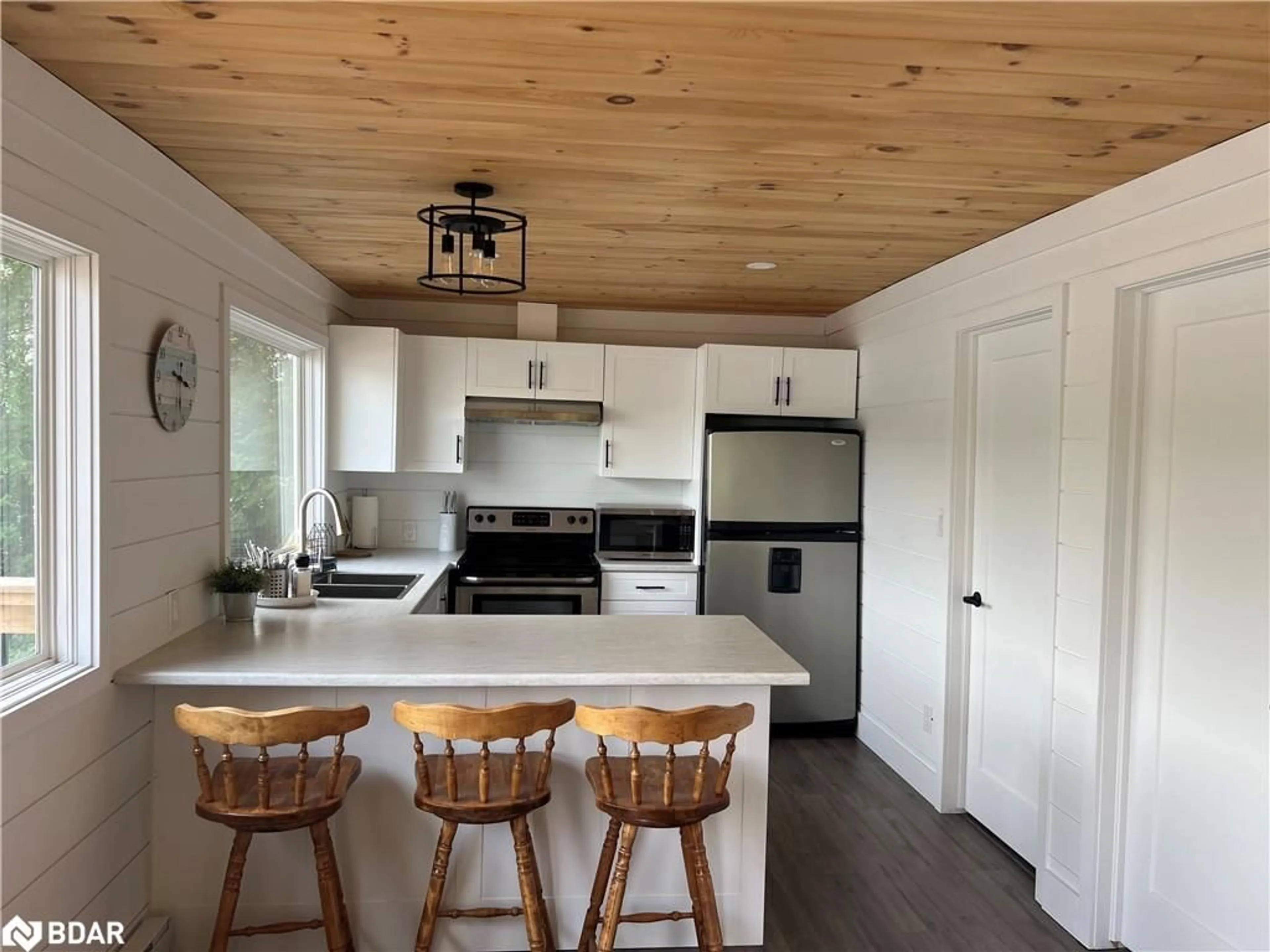 Open concept kitchen, wood/laminate floor for 203 Healey Lake Water Rd, ARCHIPELAGO Ontario P0C 1H0