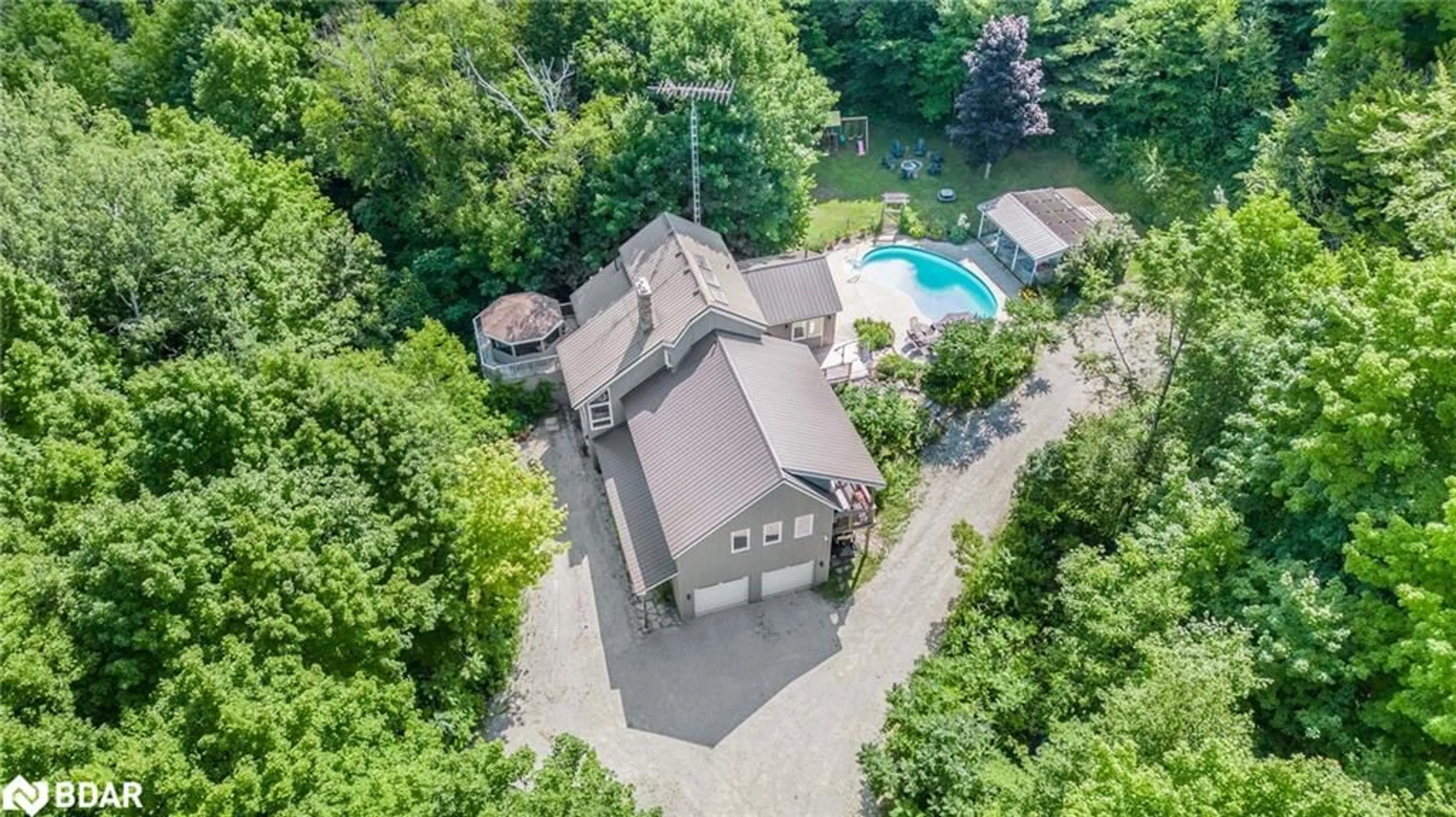 A pic from outside/outdoor area/front of a property/back of a property/a pic from drone, street for 1241 Bass Lake Sideroad, Oro-Medonte Ontario L0L 1T0