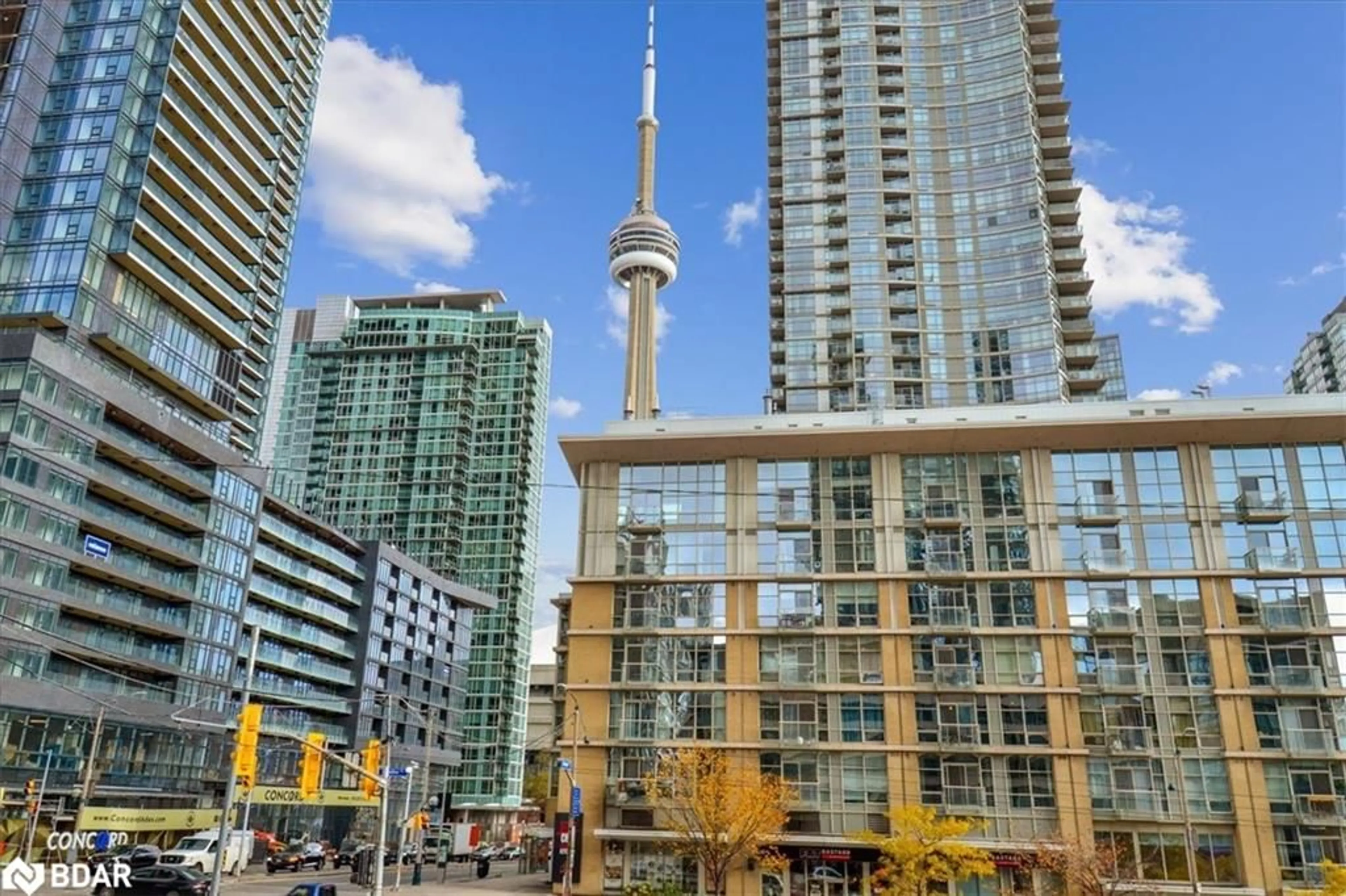 Patio, city buildings view from balcony for 15 Brunel Crt #201, Toronto Ontario M5V 3Y4