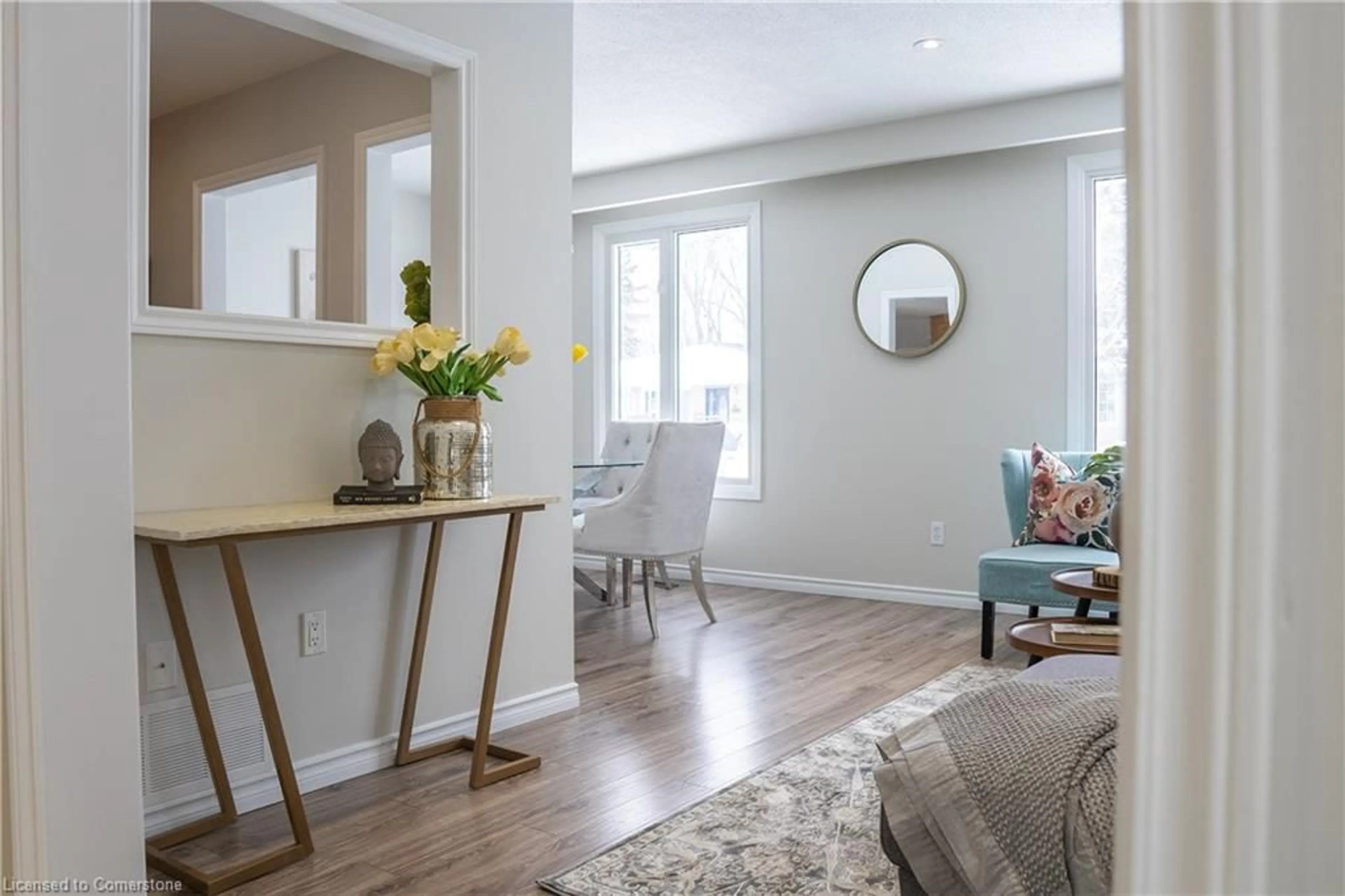 Living room with furniture, wood/laminate floor for 74 Edelwild Dr, Orangeville Ontario L9W 2Y7