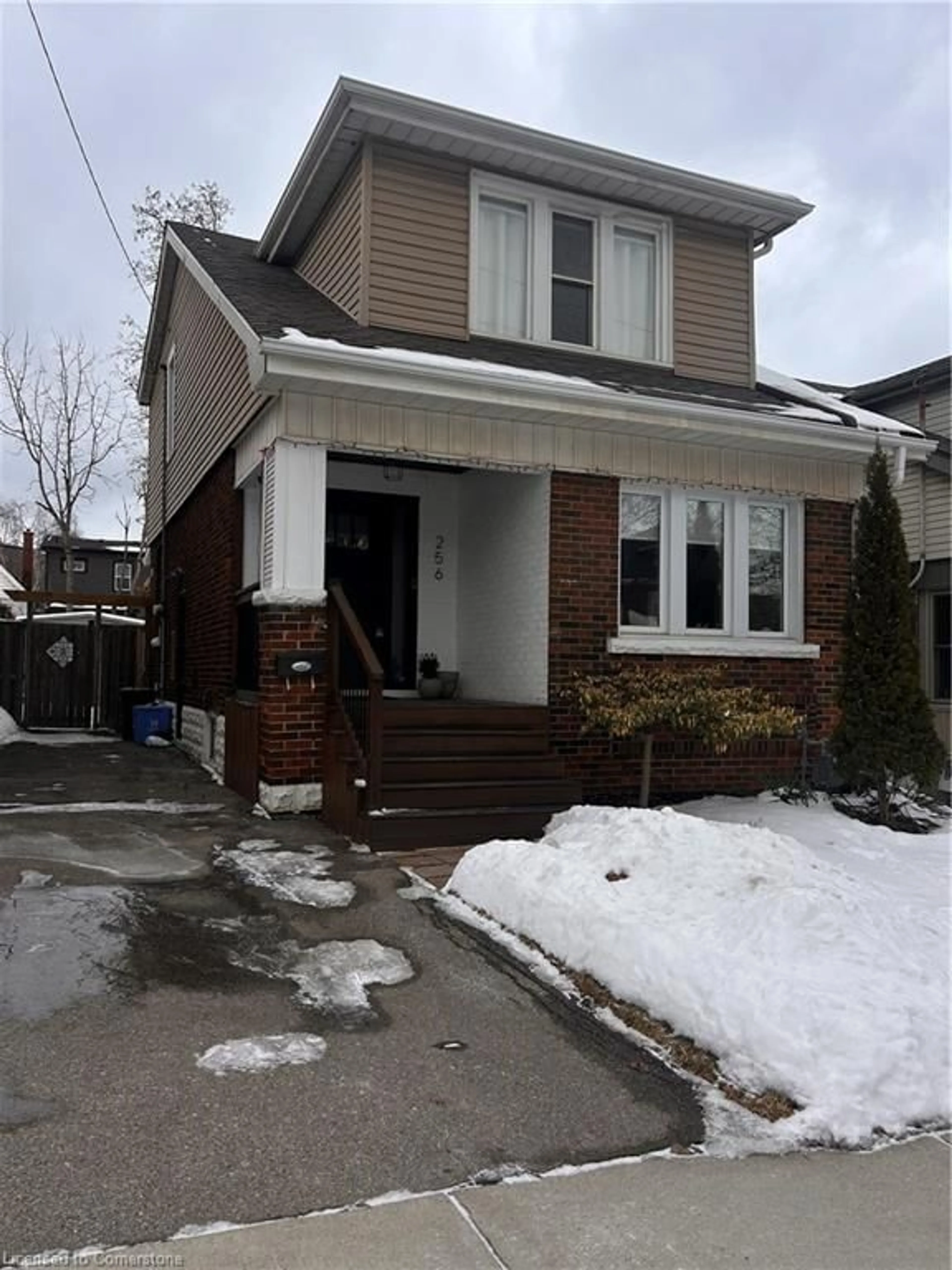 Home with brick exterior material, street for 256 London St, Hamilton Ontario L8K 2H2