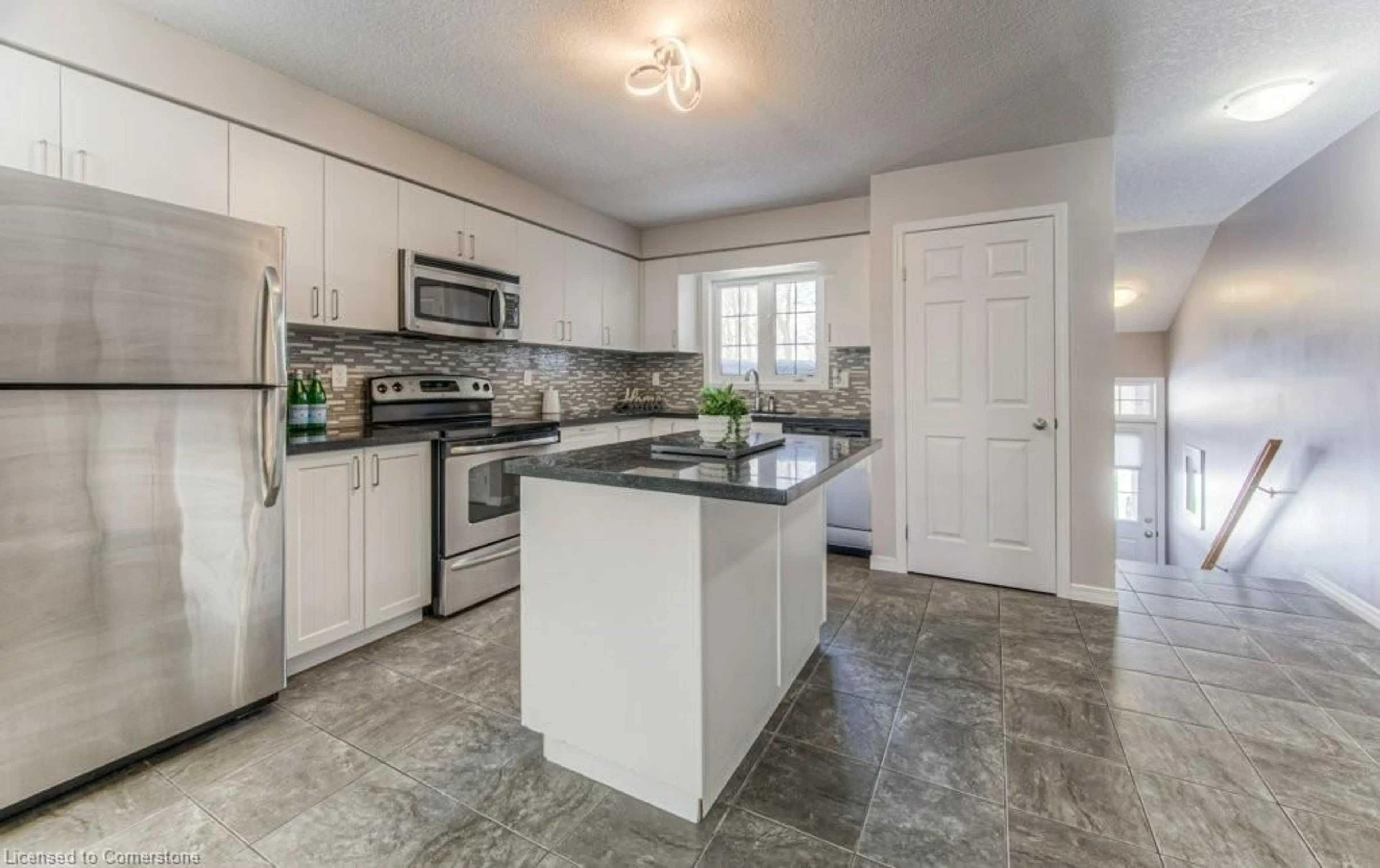 Open concept kitchen, ceramic/tile floor for 1941 Ottawa St #C10, Kitchener Ontario N2E 0C2