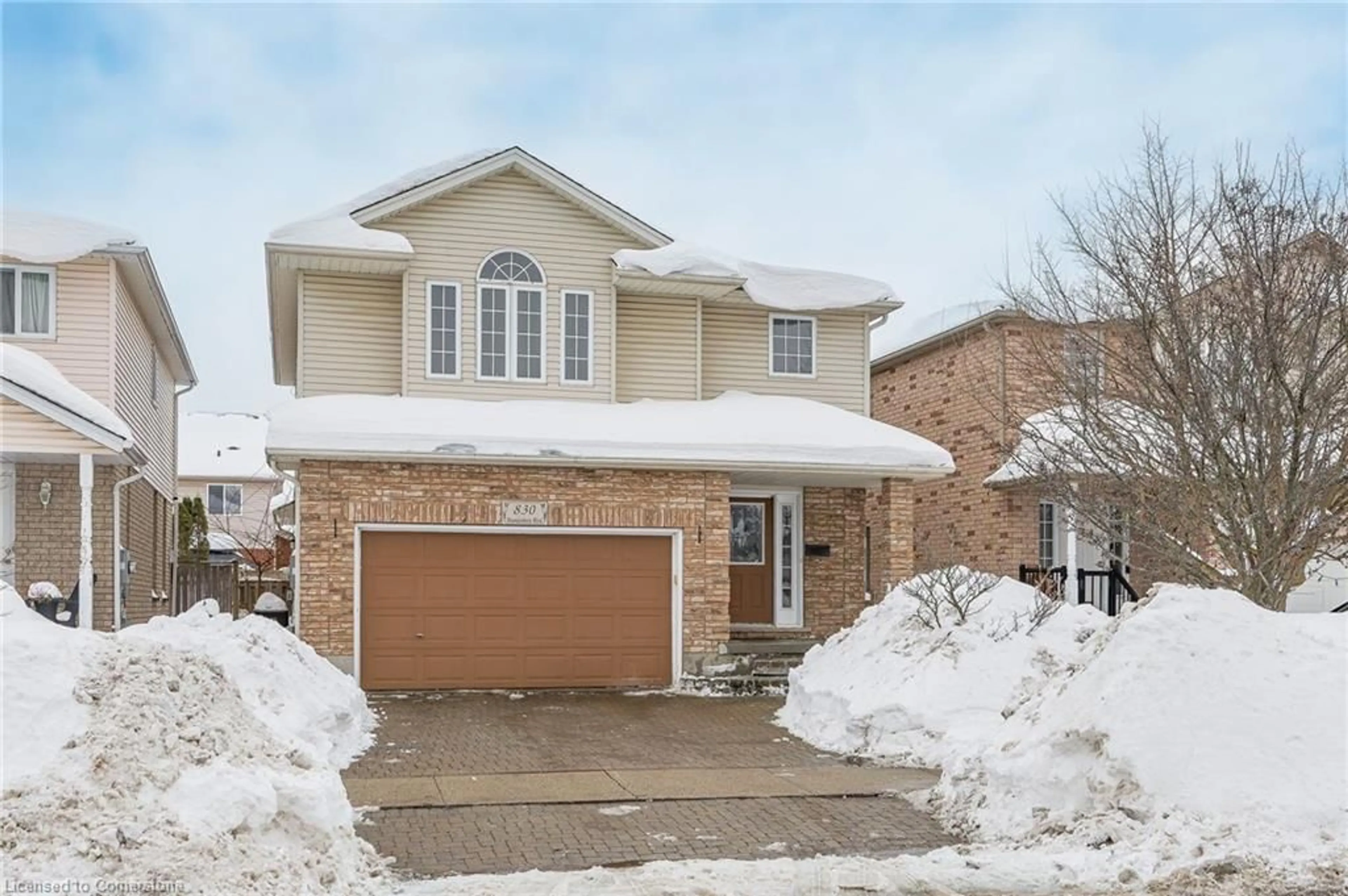 Home with brick exterior material, street for 830 Brandenburg Blvd, Waterloo Ontario N2T 2X3