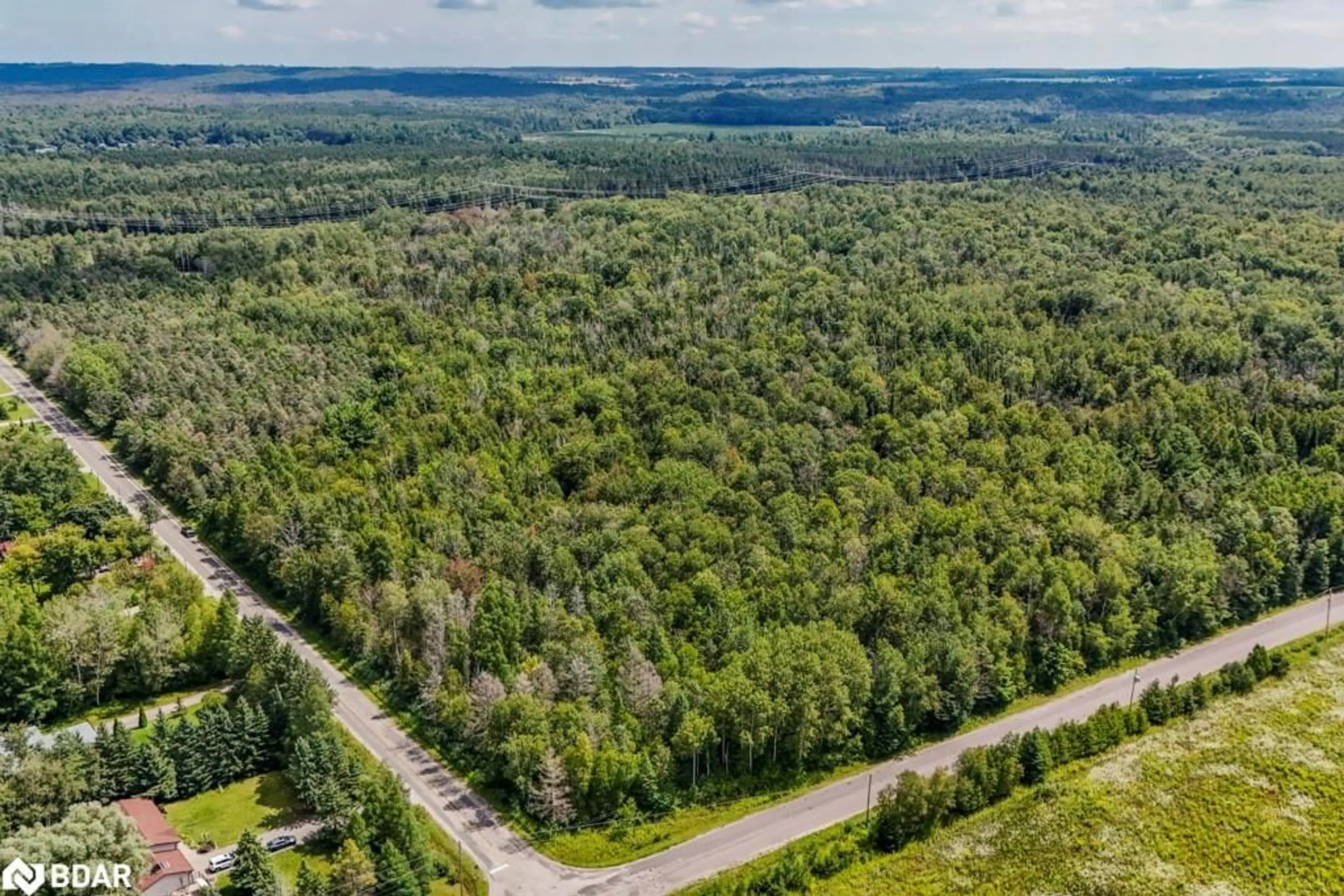 A pic from outside/outdoor area/front of a property/back of a property/a pic from drone, forest/trees view for 5349 30th Side Rd, Essa Ontario L0M 1T0