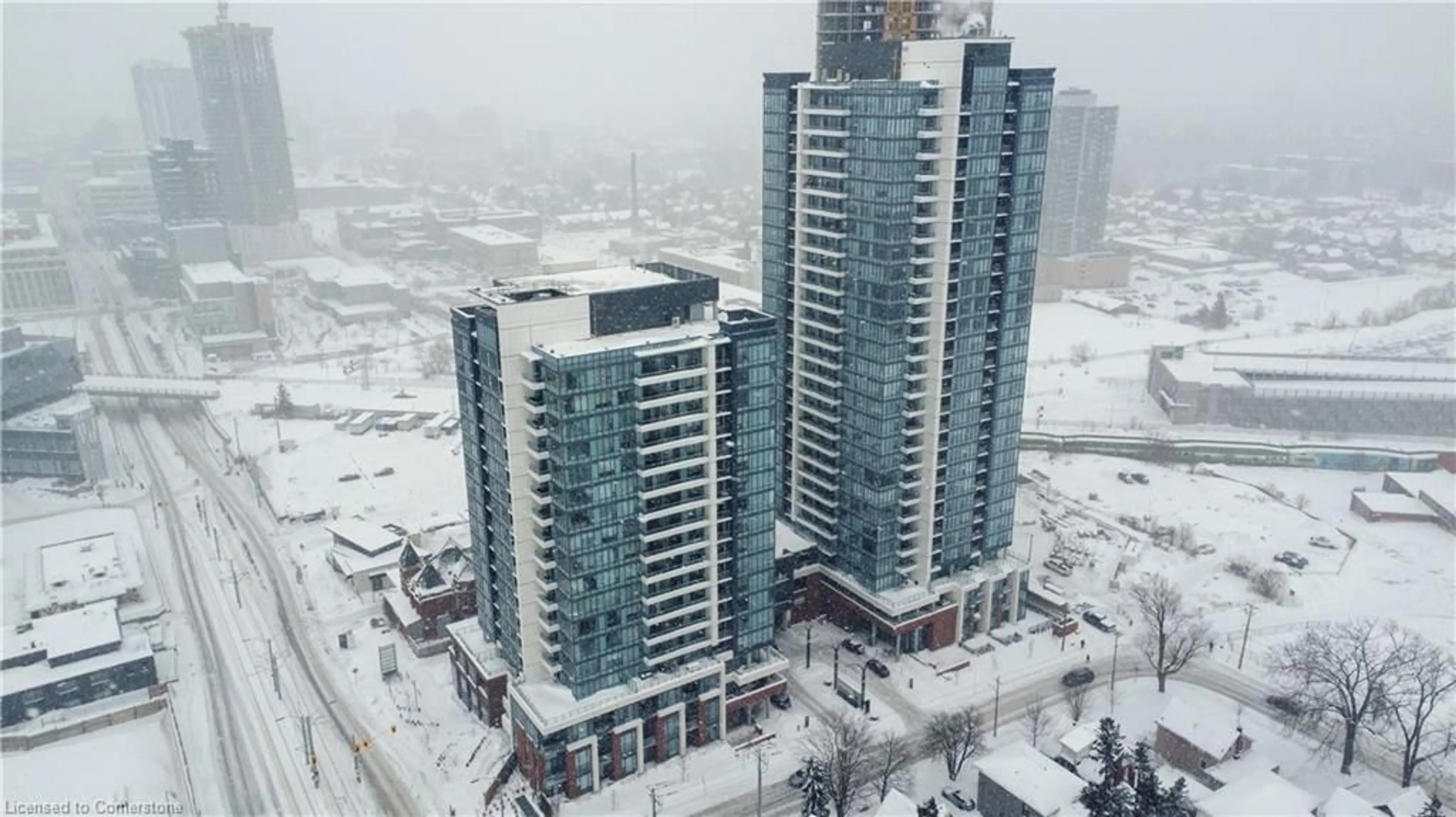 A pic from outside/outdoor area/front of a property/back of a property/a pic from drone, city buildings view from balcony for 5 Wellington St #1505, Kitchener Ontario N2G 1C7