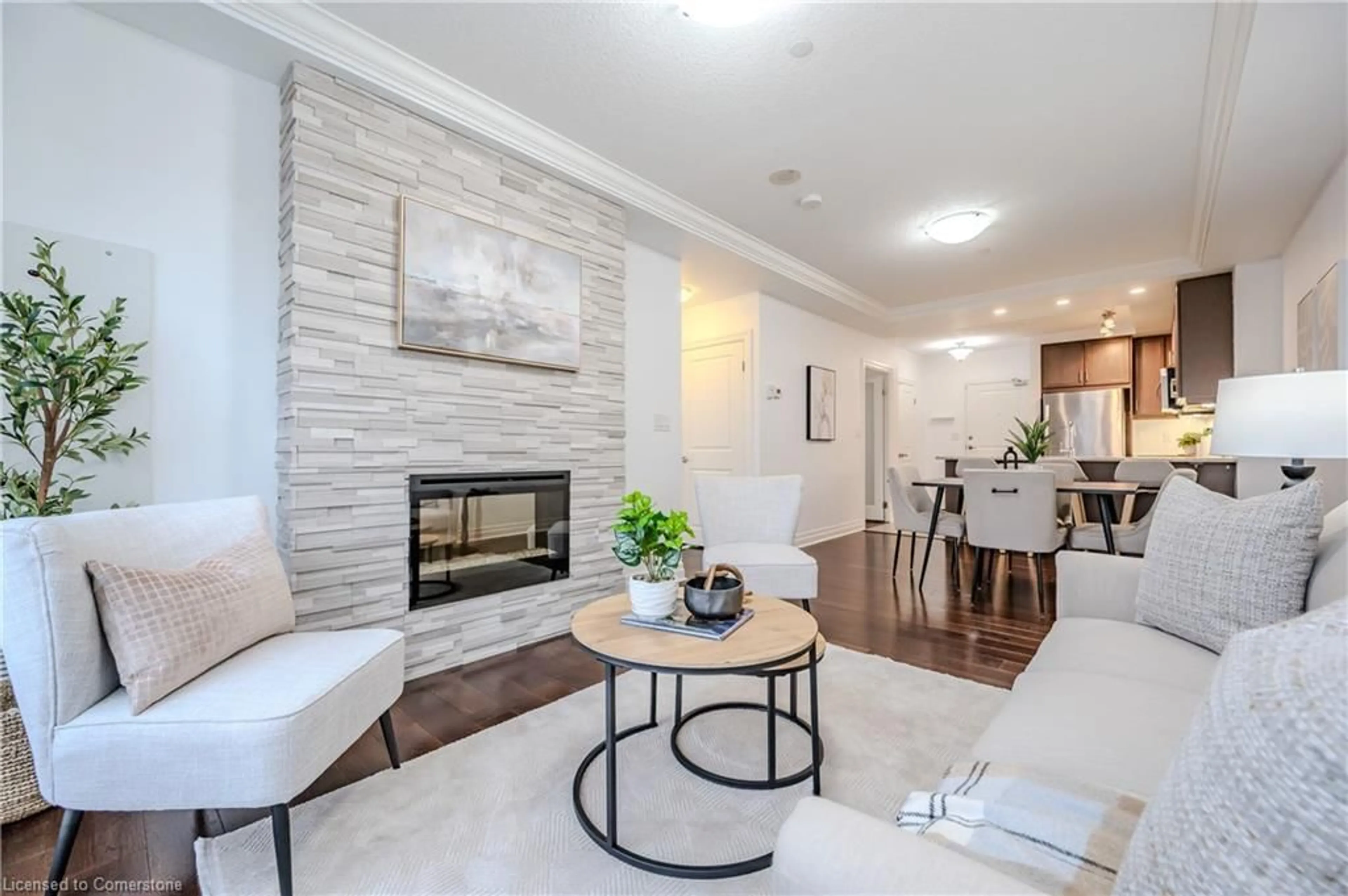 Living room with furniture, ceramic/tile floor for 150 Wellington St #507, Guelph Ontario N1H 3R2