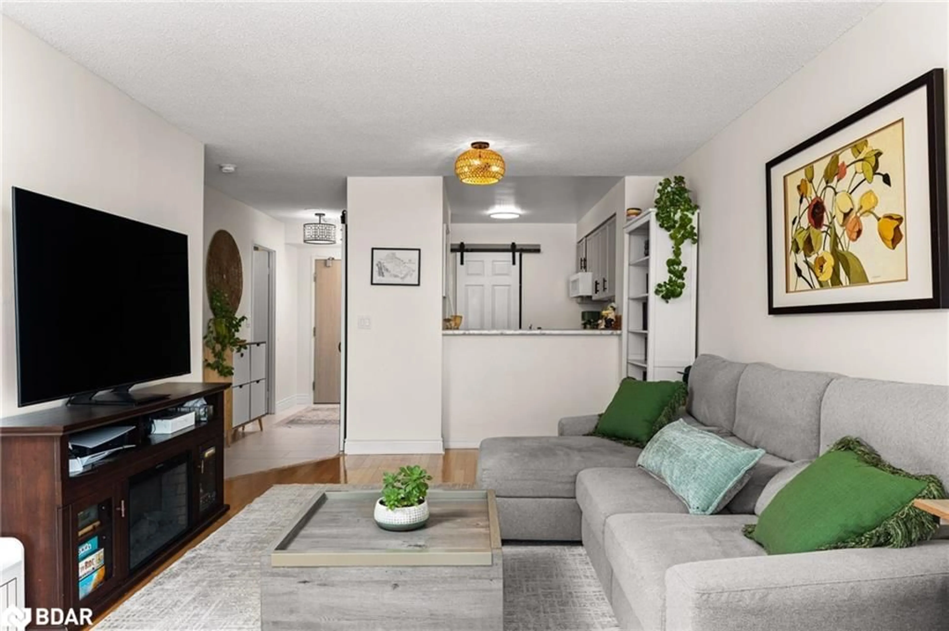 Living room with furniture, unknown for 140 Dunlop St #504, Barrie Ontario L4M 6H9