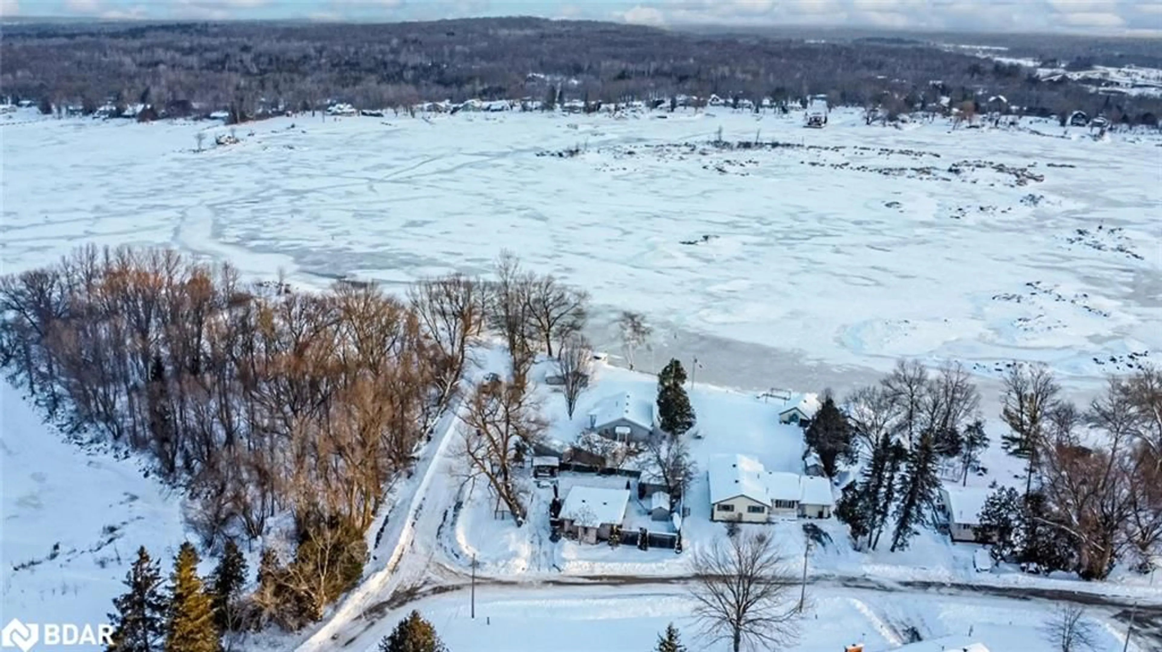 A pic from outside/outdoor area/front of a property/back of a property/a pic from drone, water/lake/river/ocean view for 12 Balsam St, Waubaushene Ontario L0K 2C0