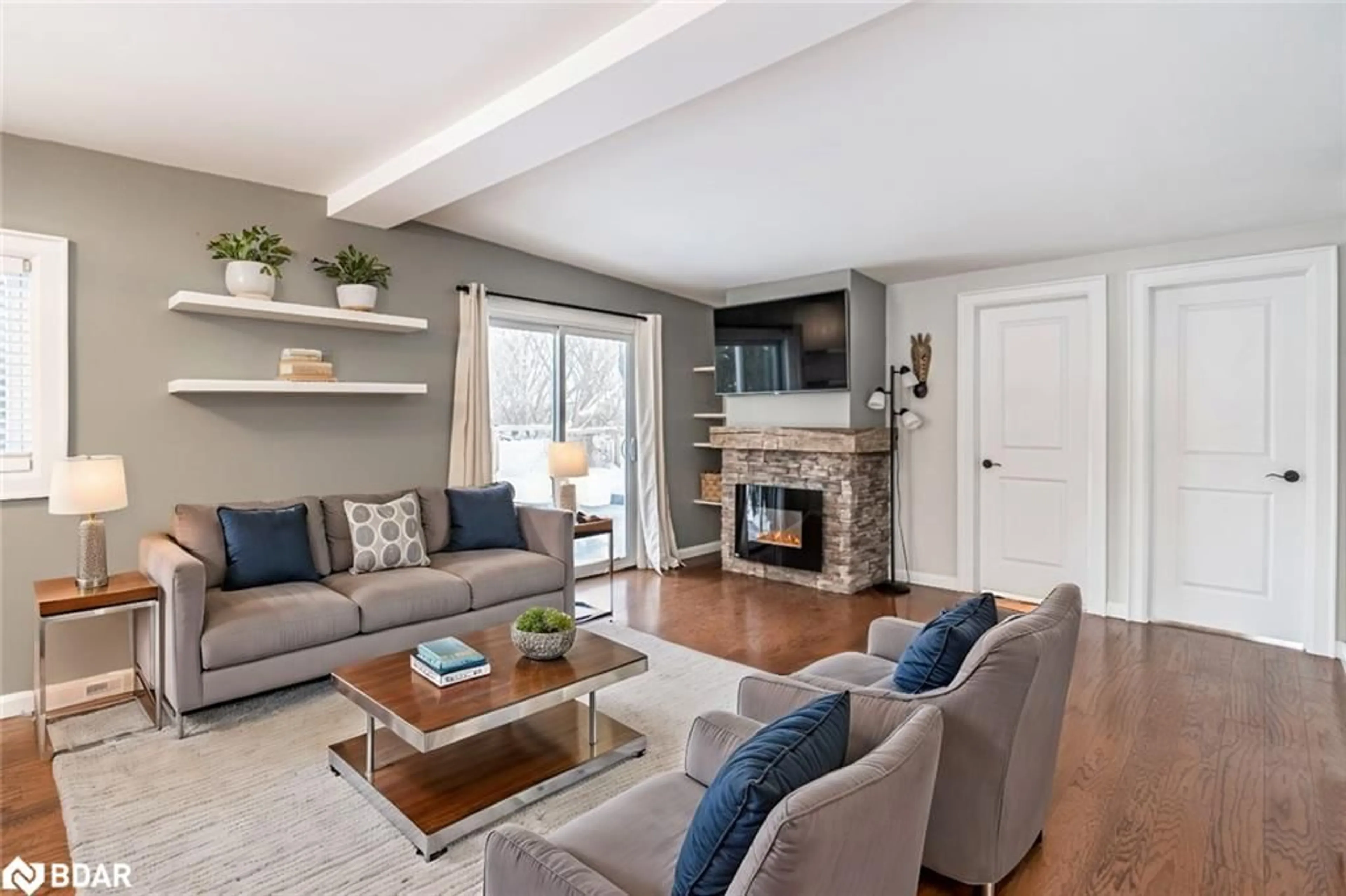 Living room with furniture, wood/laminate floor for 12 Balsam St, Waubaushene Ontario L0K 2C0