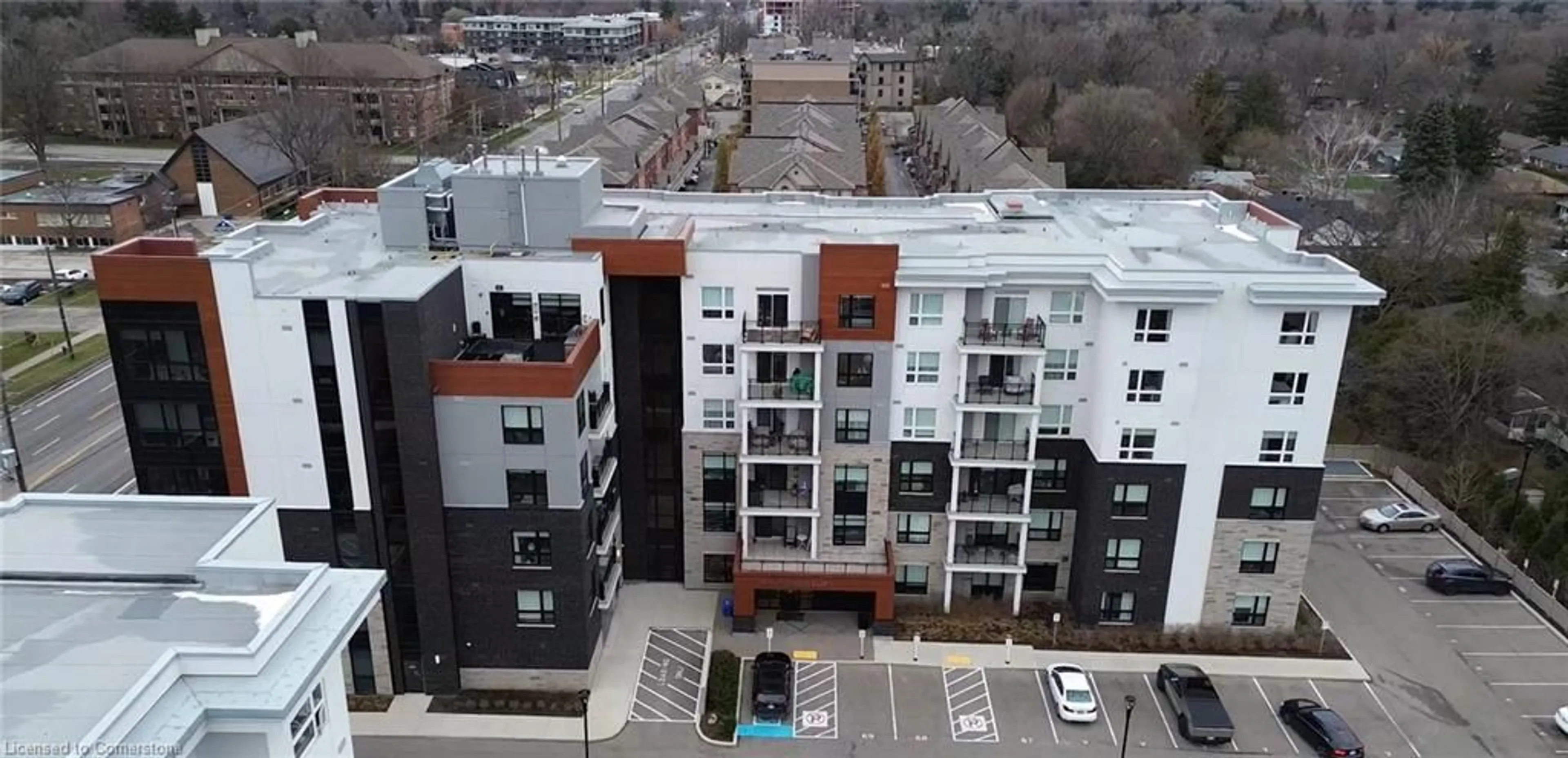 A pic from outside/outdoor area/front of a property/back of a property/a pic from drone, city buildings view from balcony for 340 Plains Rd #411, Burlington Ontario L7T 0C2