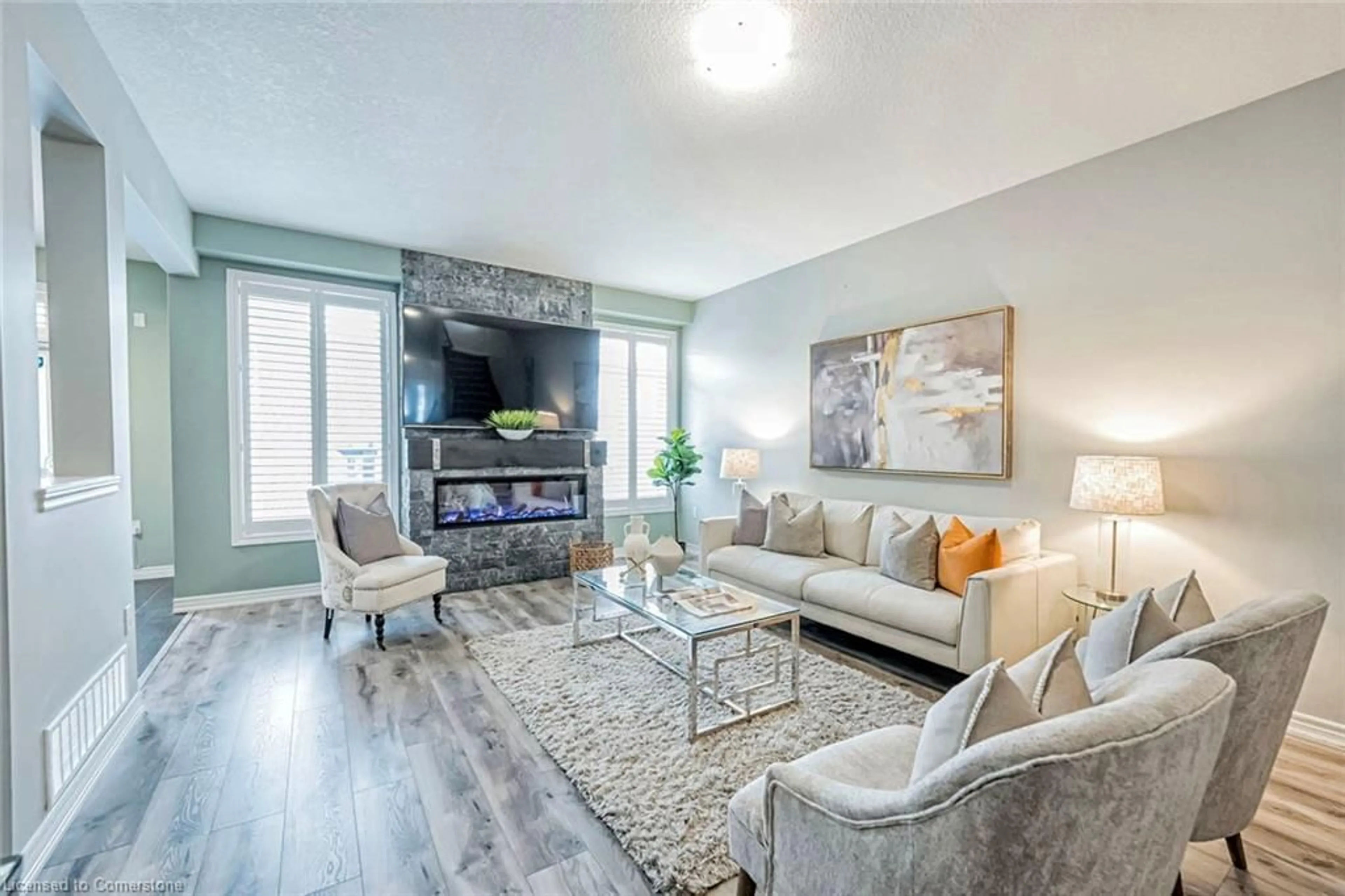 Living room with furniture, unknown for 26 Winslow Way, Stoney Creek Ontario L8J 0G9