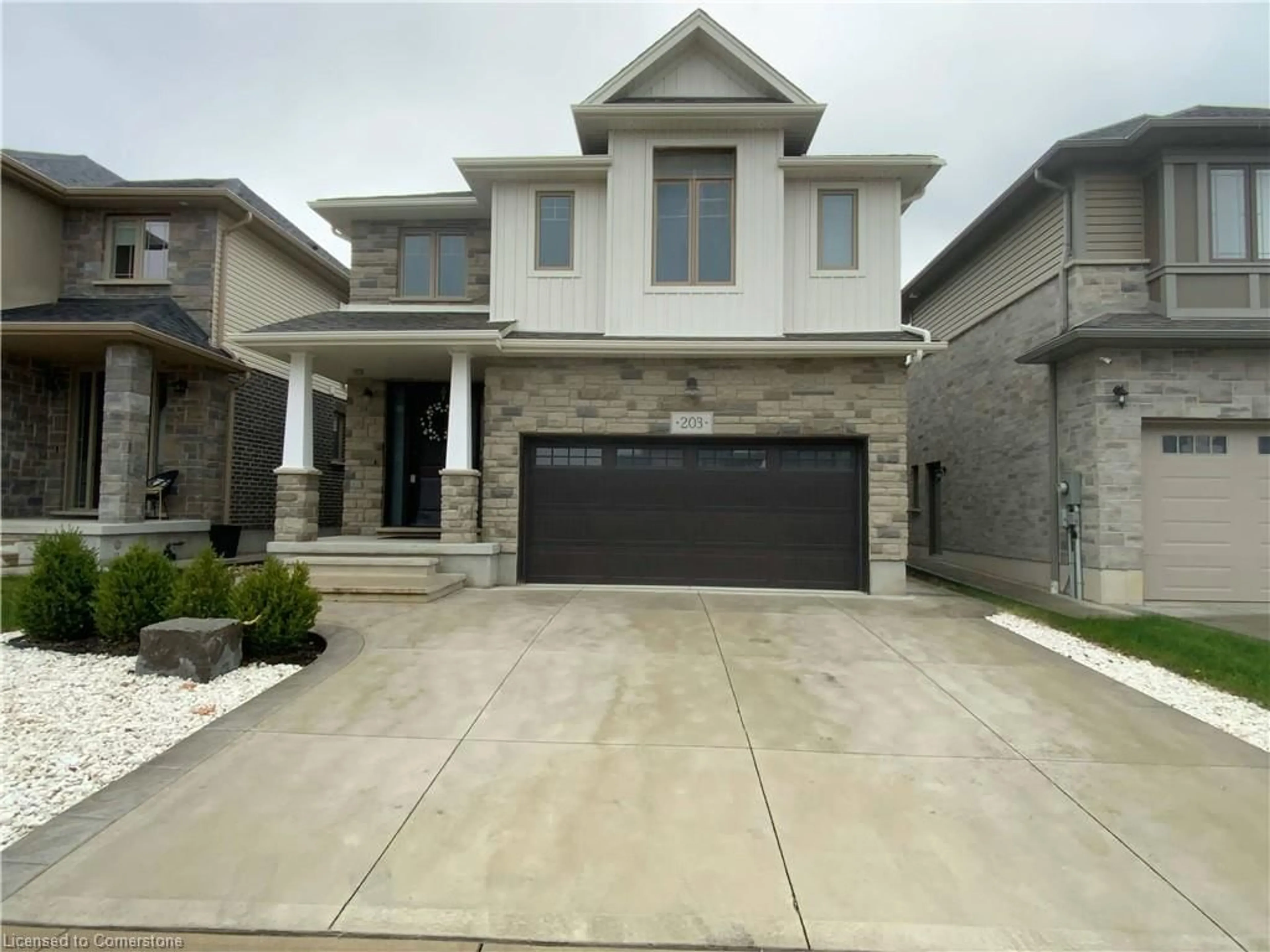 Home with brick exterior material, street for 203 Carriage Way, Waterloo Ontario N2K 0C6