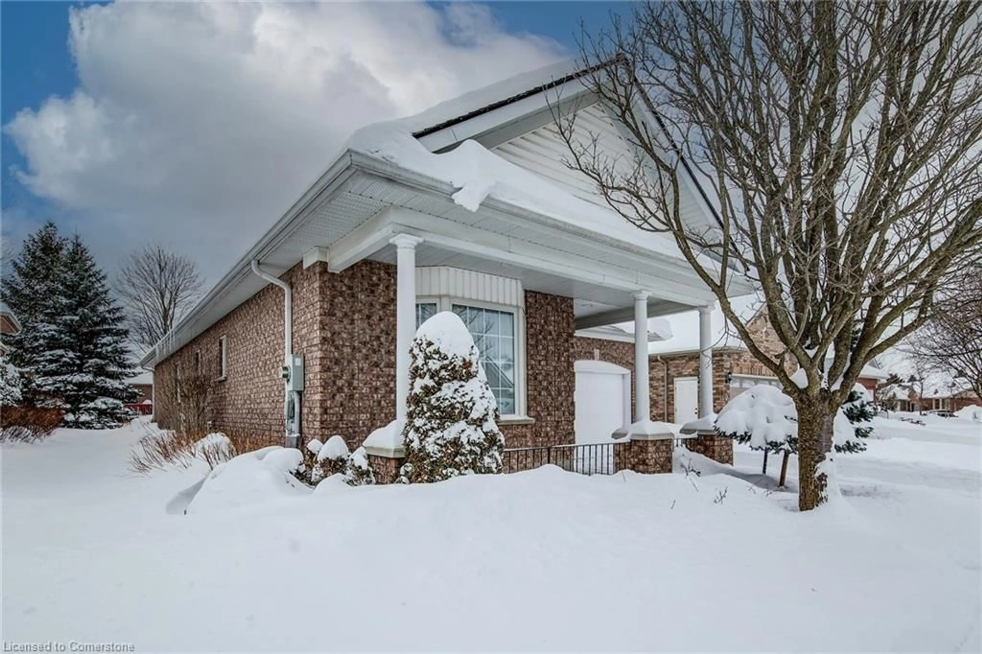 Home with brick exterior material, street for 93 Basswood Dr, Guelph Ontario N1G 4X7