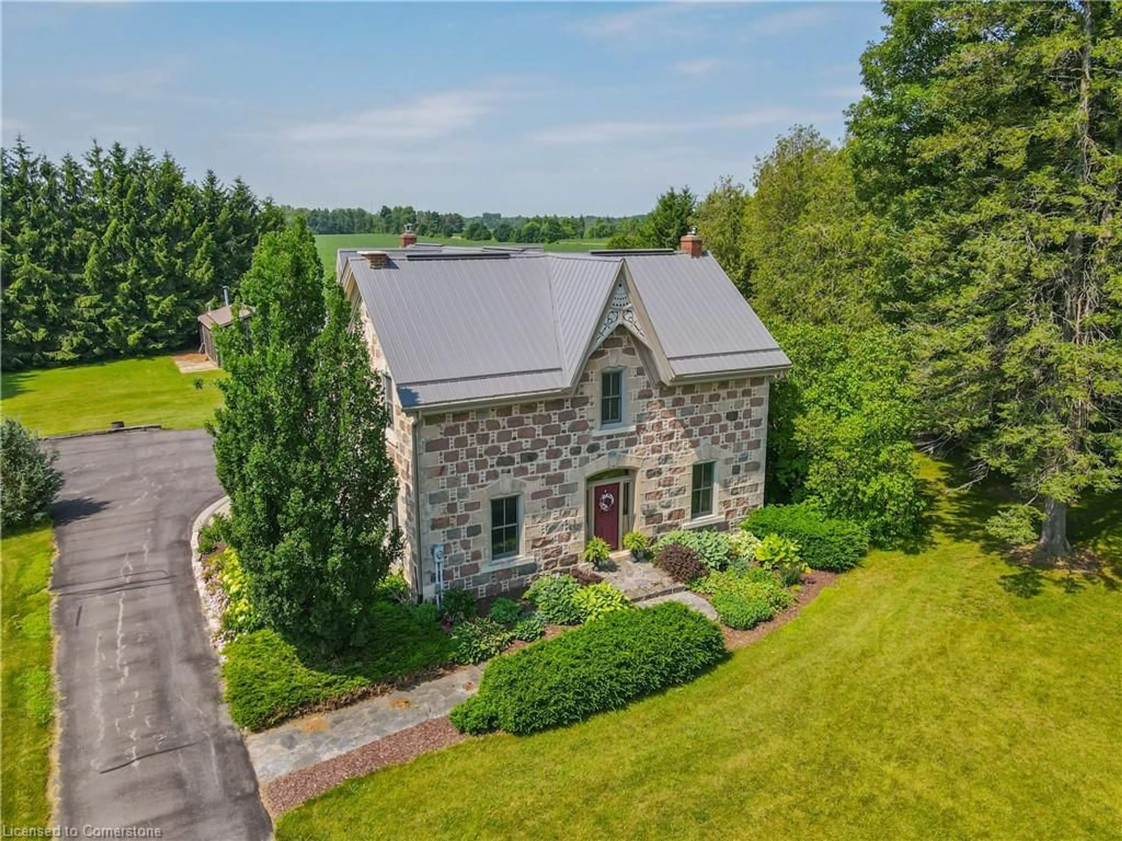 A pic from outside/outdoor area/front of a property/back of a property/a pic from drone, building for 6086 5th Line, Guelph Ontario N0B 2K0