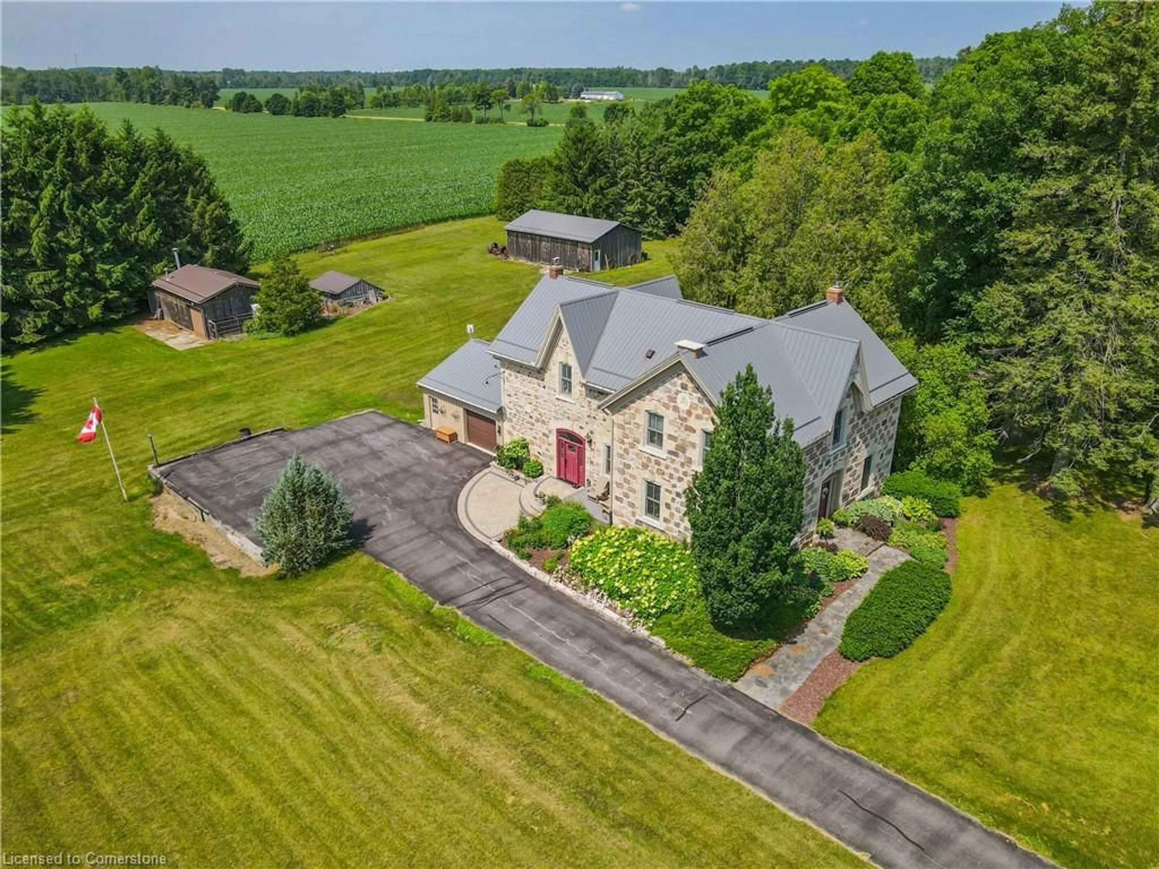 A pic from outside/outdoor area/front of a property/back of a property/a pic from drone, building for 6086 5th Line, Guelph Ontario N0B 2K0