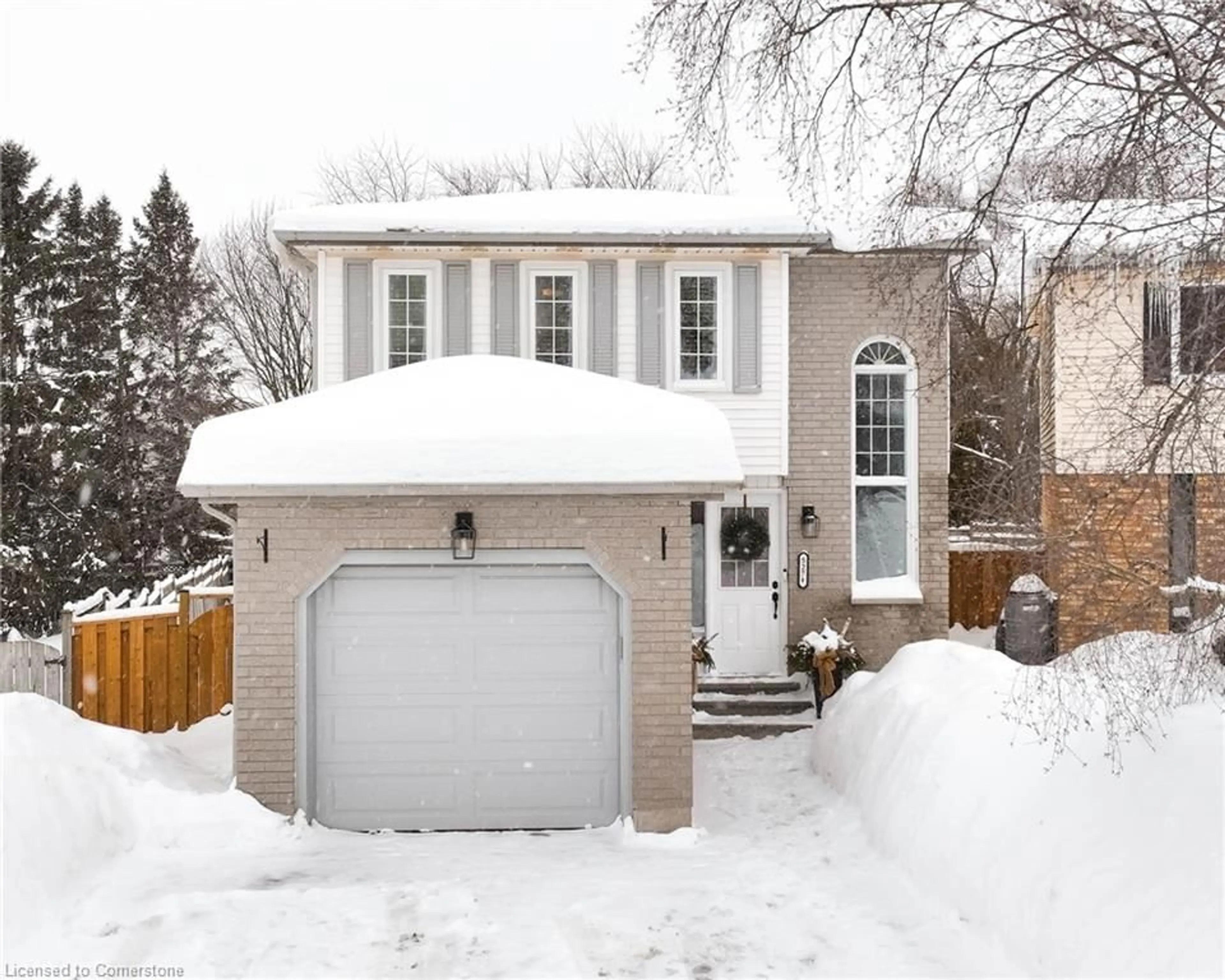 Home with brick exterior material, street for 527 Rosemeadow Cres #A, Waterloo Ontario N2T 1Z9