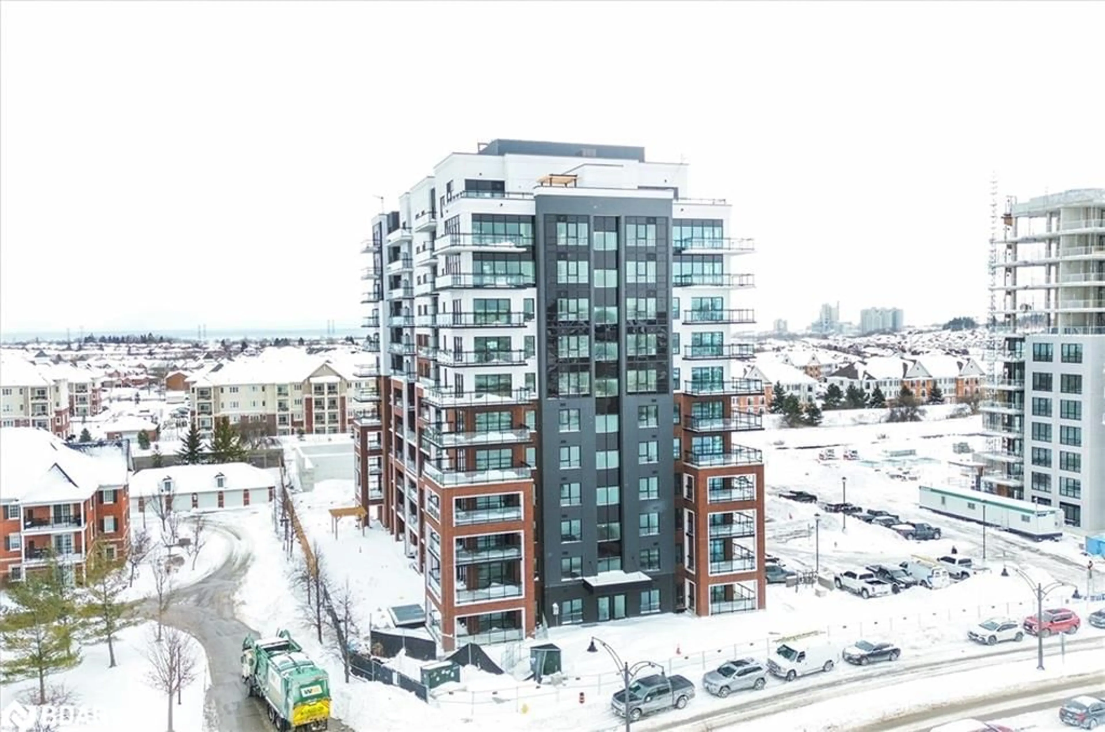 A pic from outside/outdoor area/front of a property/back of a property/a pic from drone, city buildings view from balcony for 55 Clarington Blvd #410, Bowmanville Ontario L1C 7J4