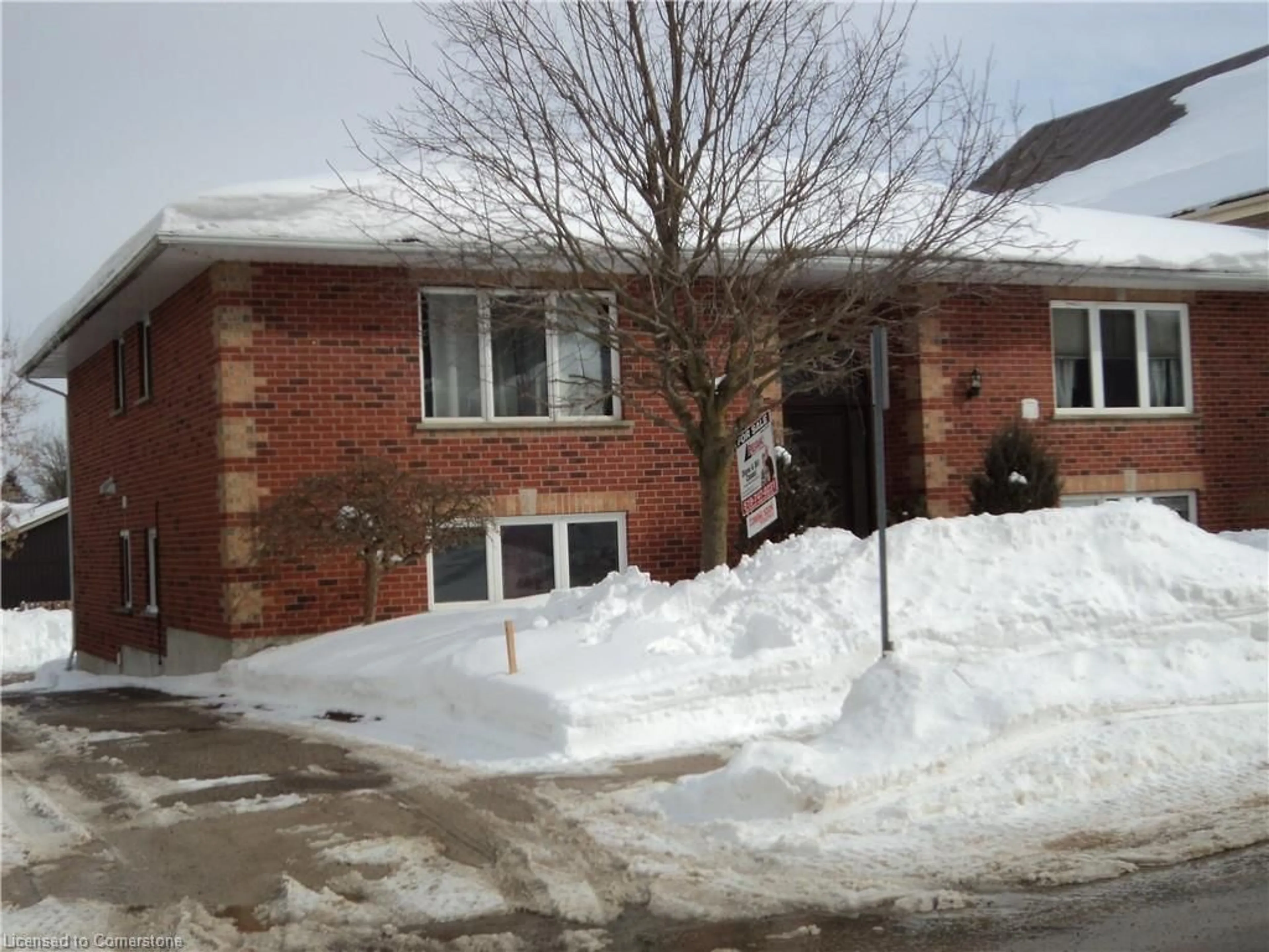 Home with brick exterior material, street for 14 Spring St St, Drayton Ontario N0G 1P0