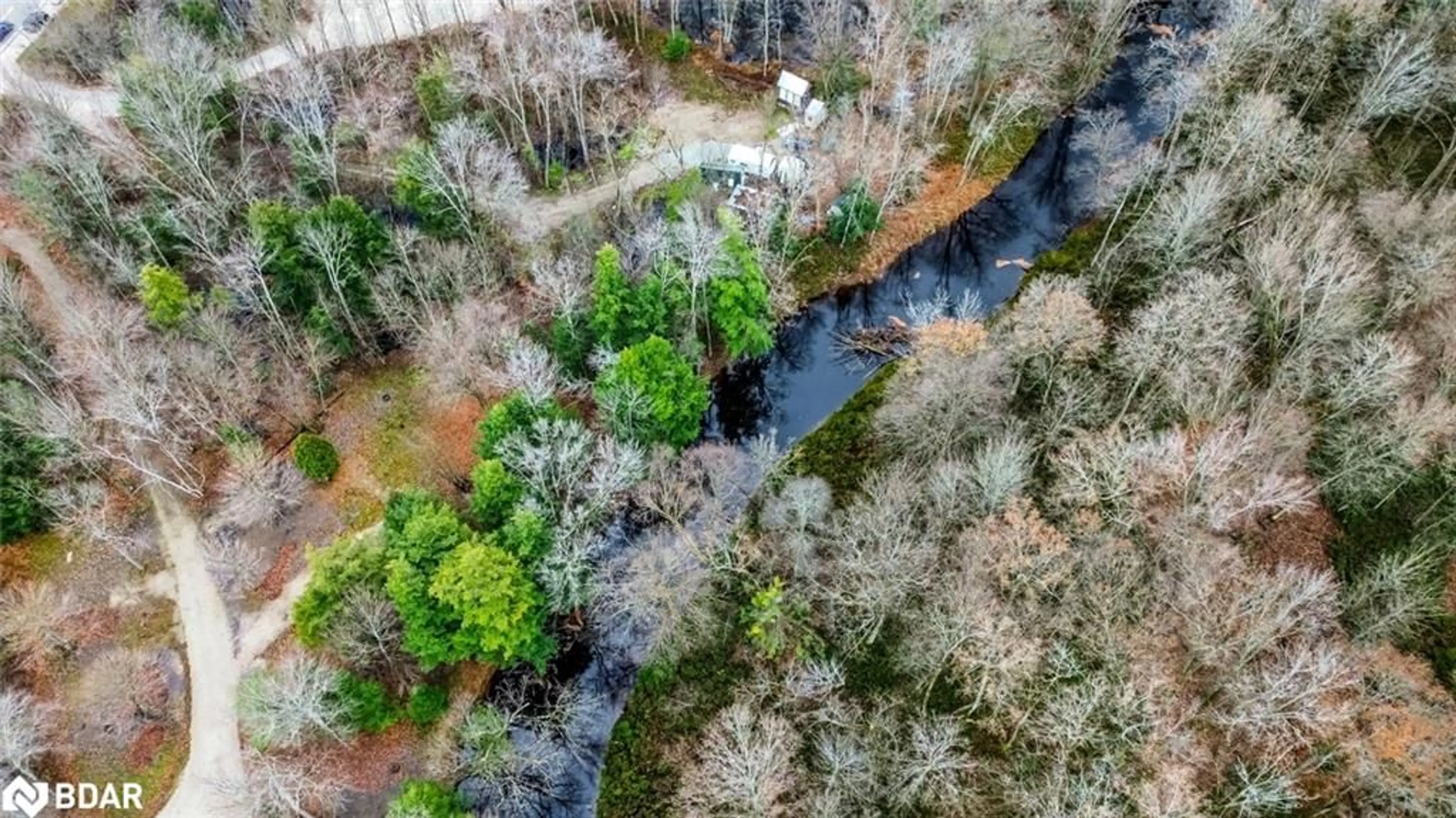 A pic from outside/outdoor area/front of a property/back of a property/a pic from drone, forest/trees view for 7012 County Road 169, Washago Ontario L0K 2B0