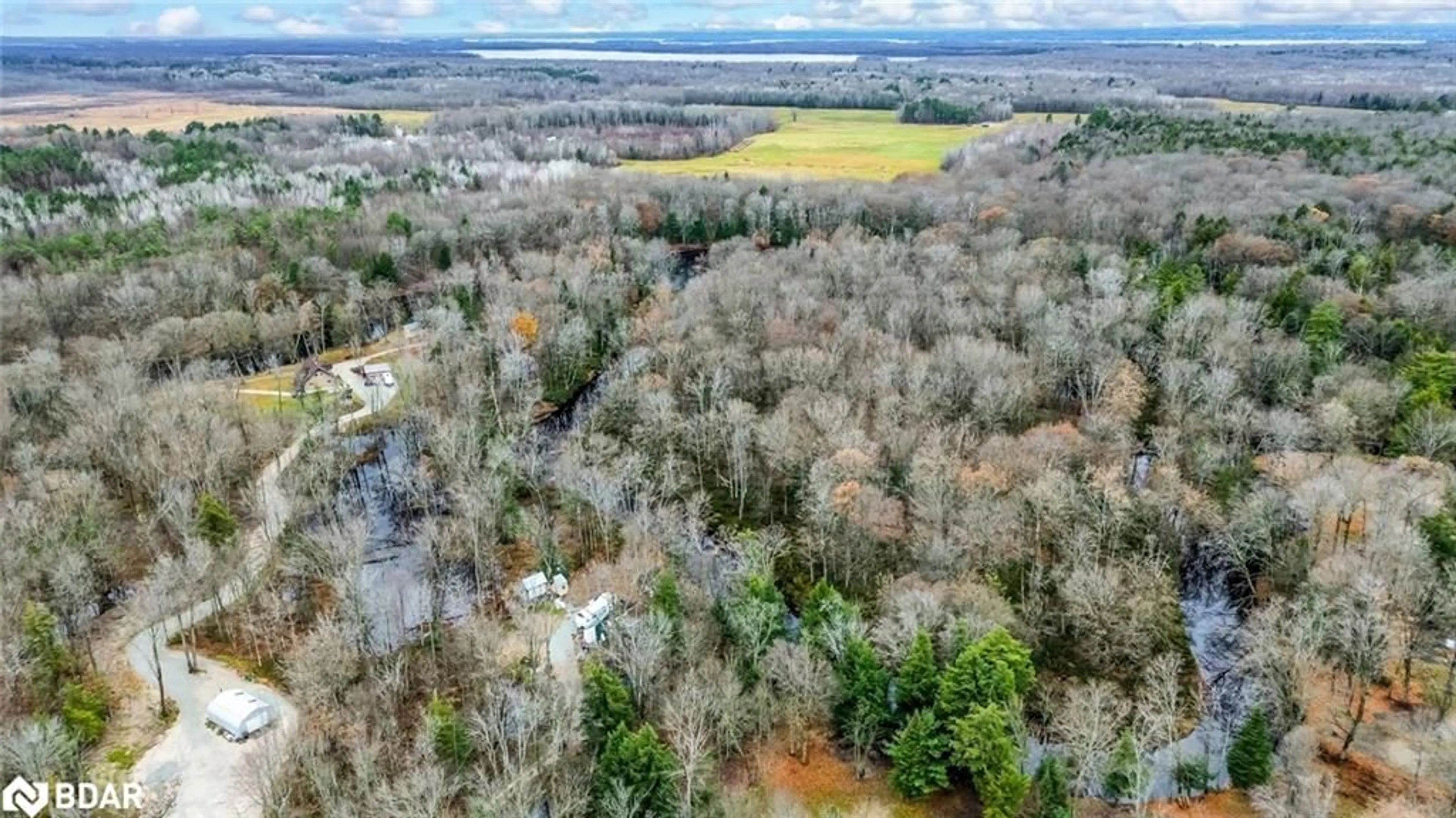 A pic from outside/outdoor area/front of a property/back of a property/a pic from drone, forest/trees view for 7012 County Road 169, Washago Ontario L0K 2B0