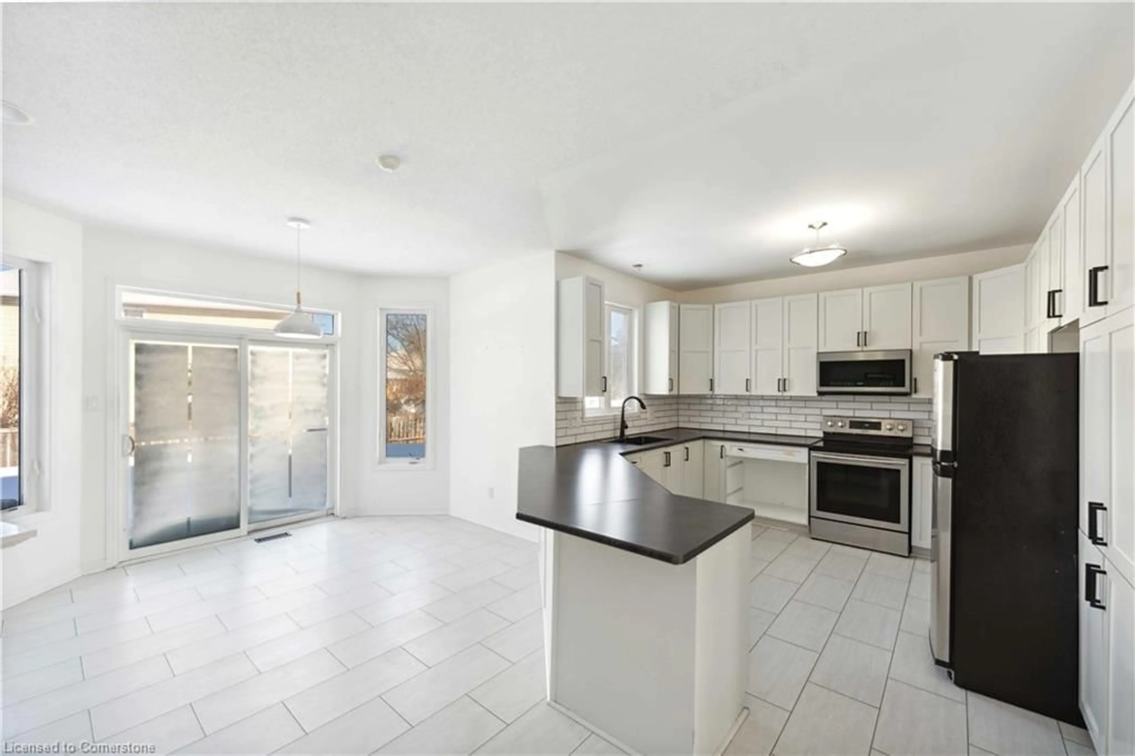 Open concept kitchen, ceramic/tile floor for 59 Baywood Dr, Stittsville Ontario K2S 2H5