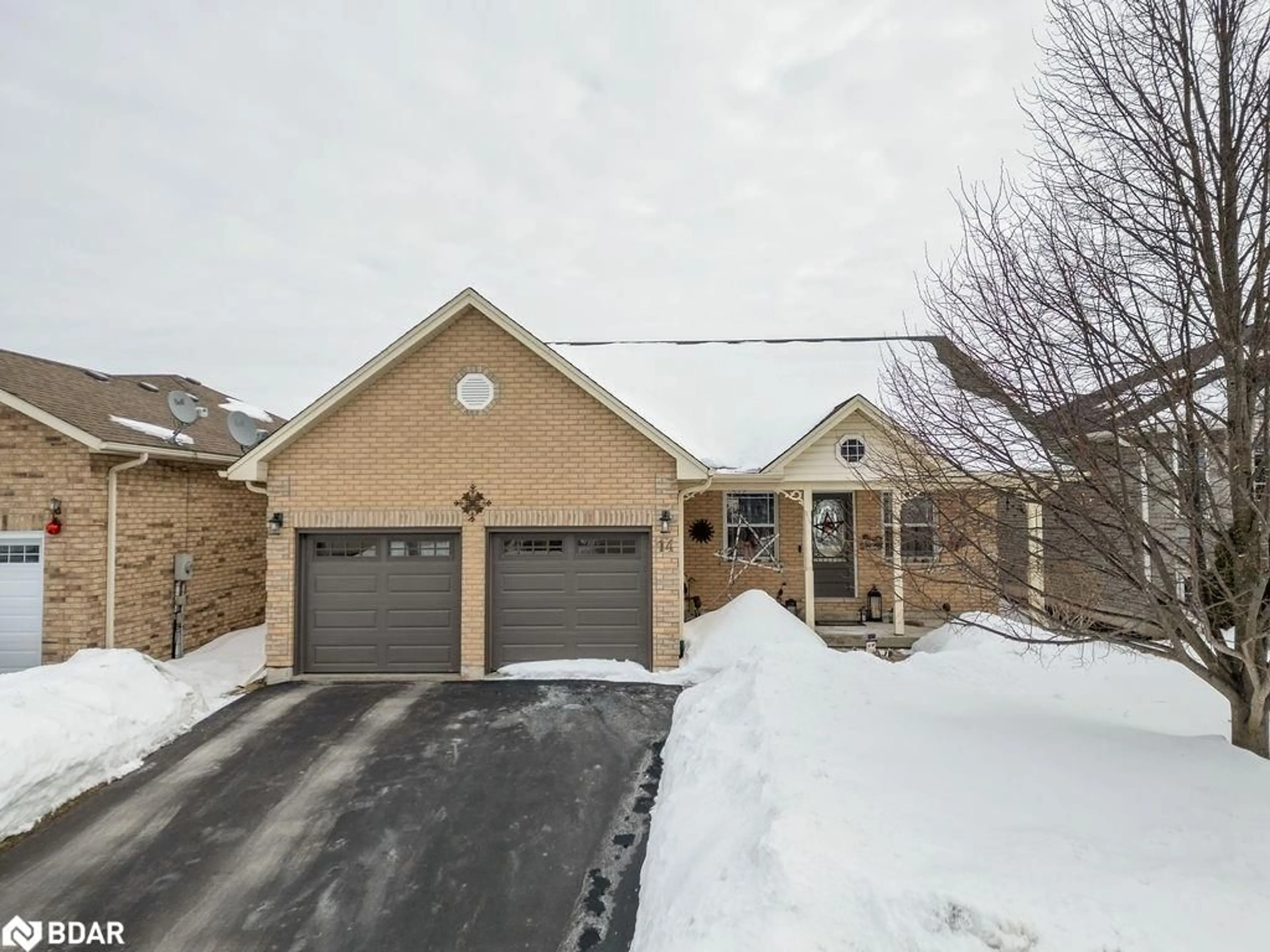 Home with brick exterior material, street for 14 Dormer Rd, Lindsay Ontario K9V 6H8