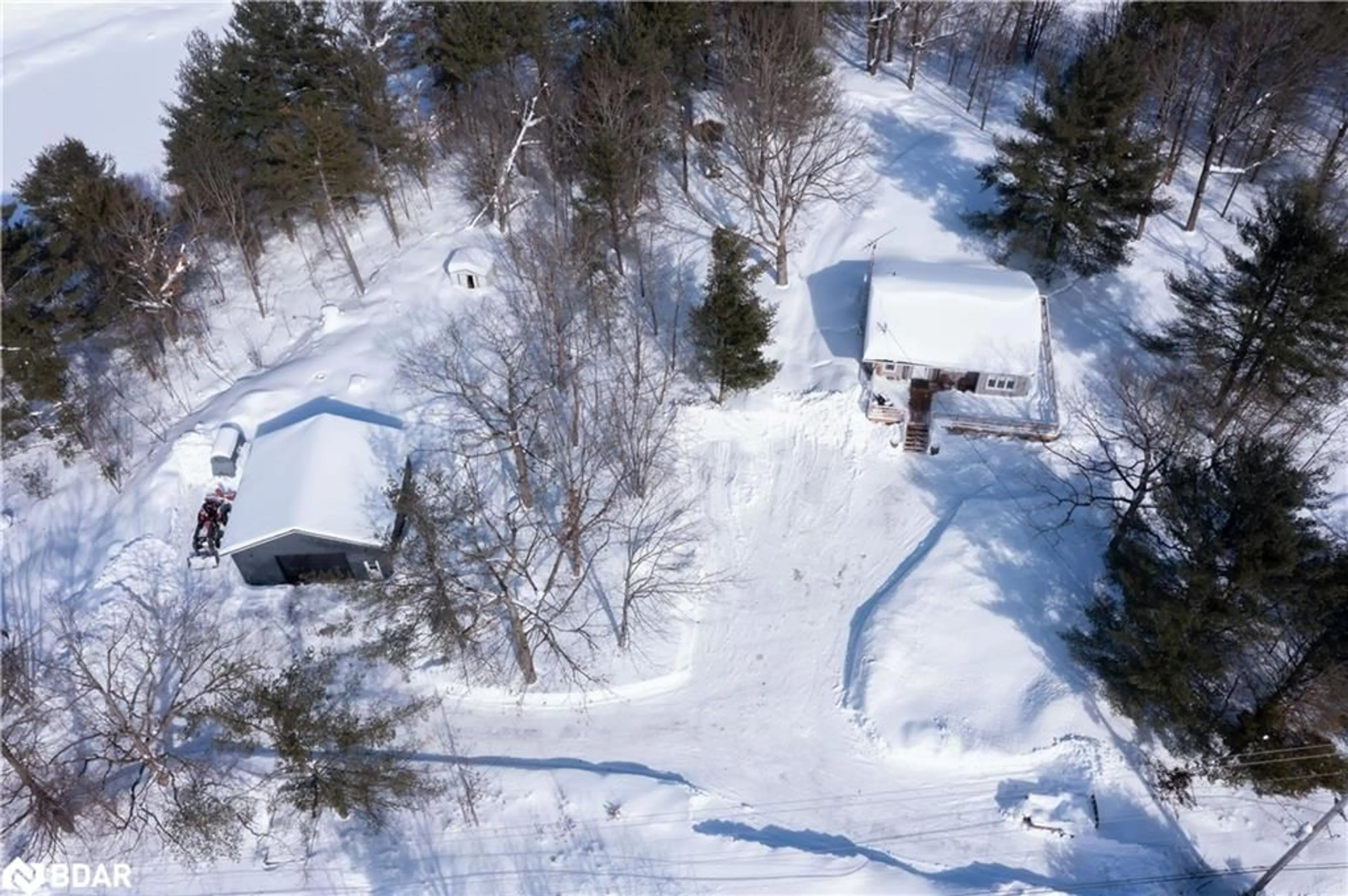 A pic from outside/outdoor area/front of a property/back of a property/a pic from drone, street for 8025 County Rd 169, Washago Ontario L0K 2B0