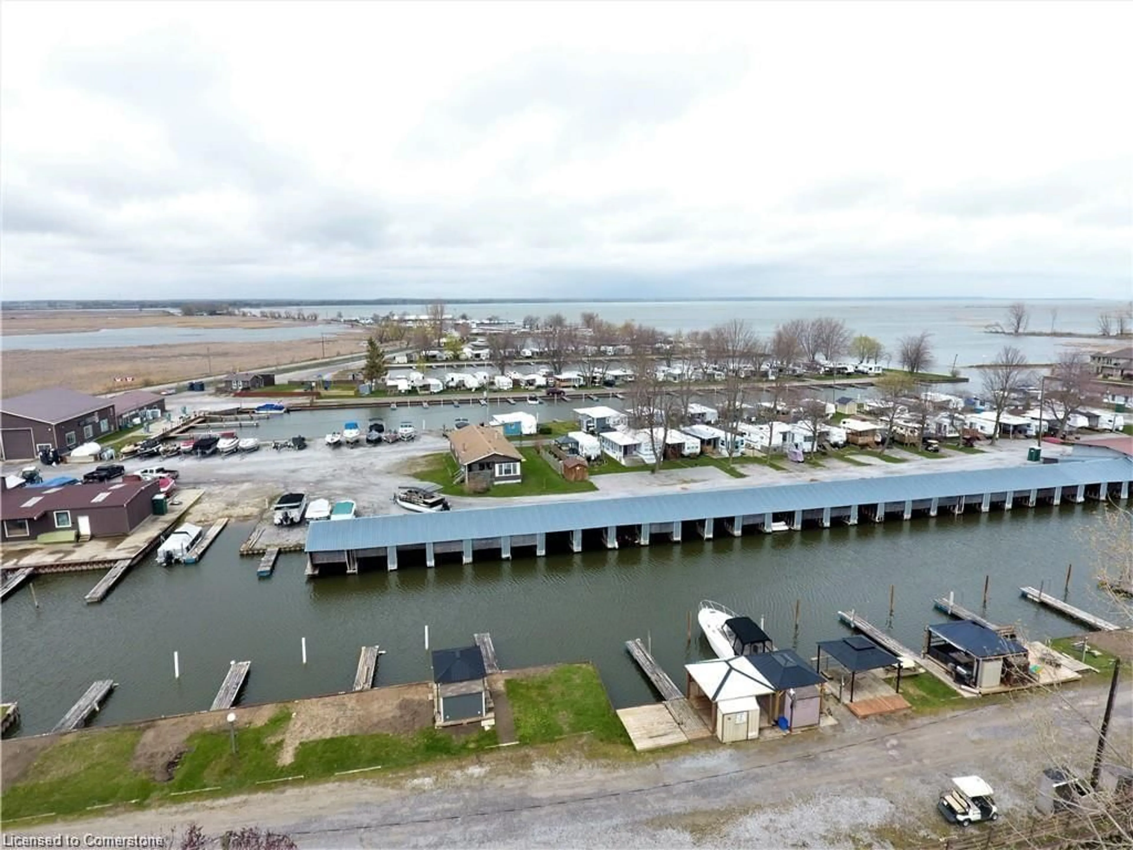 A pic from outside/outdoor area/front of a property/back of a property/a pic from drone, water/lake/river/ocean view for 24 Private Lane, Long Point Ontario N0E 1M0