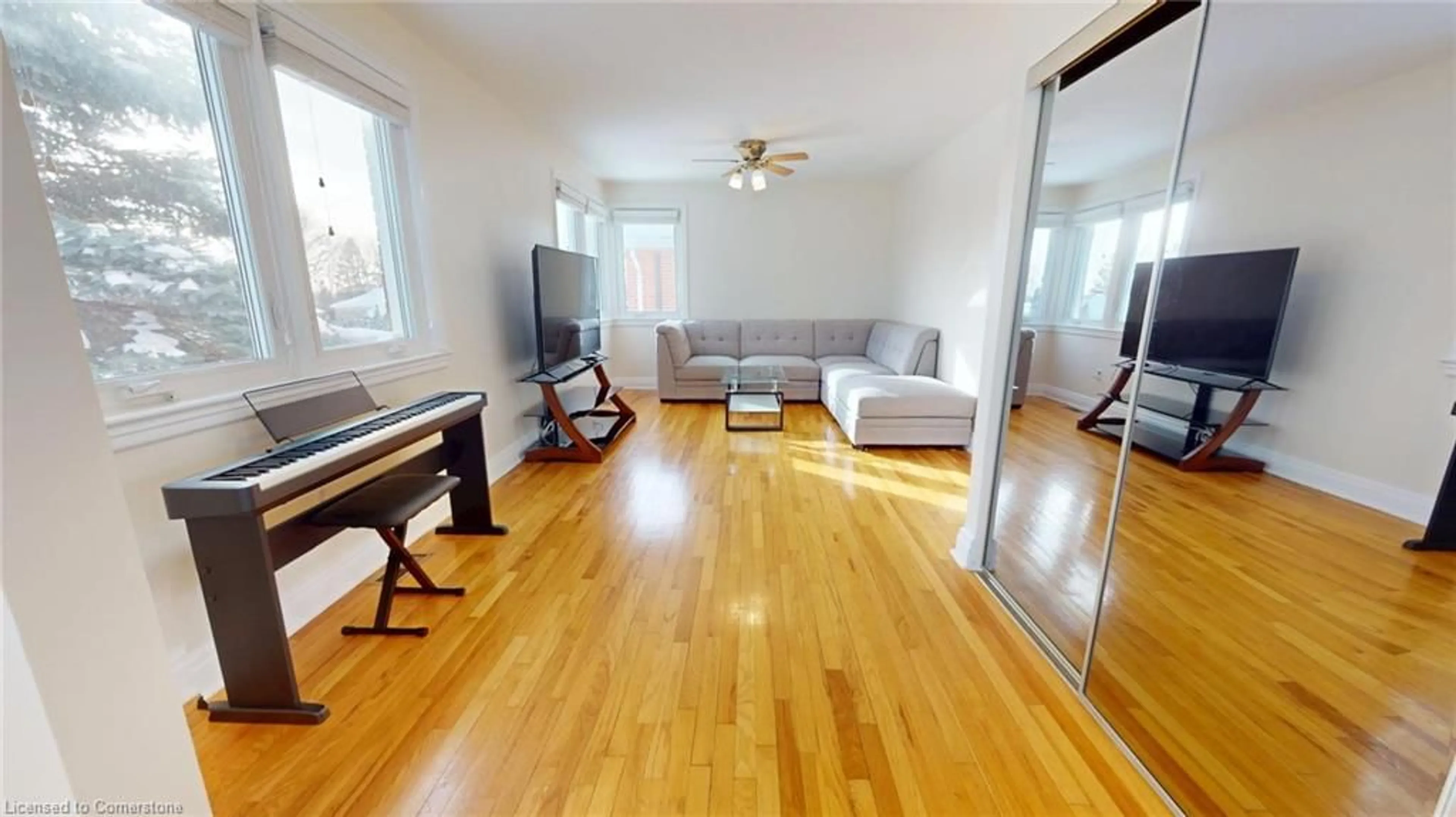 Living room with furniture, wood/laminate floor for 25 Seguin St, Ottawa Ontario K1J 6P4