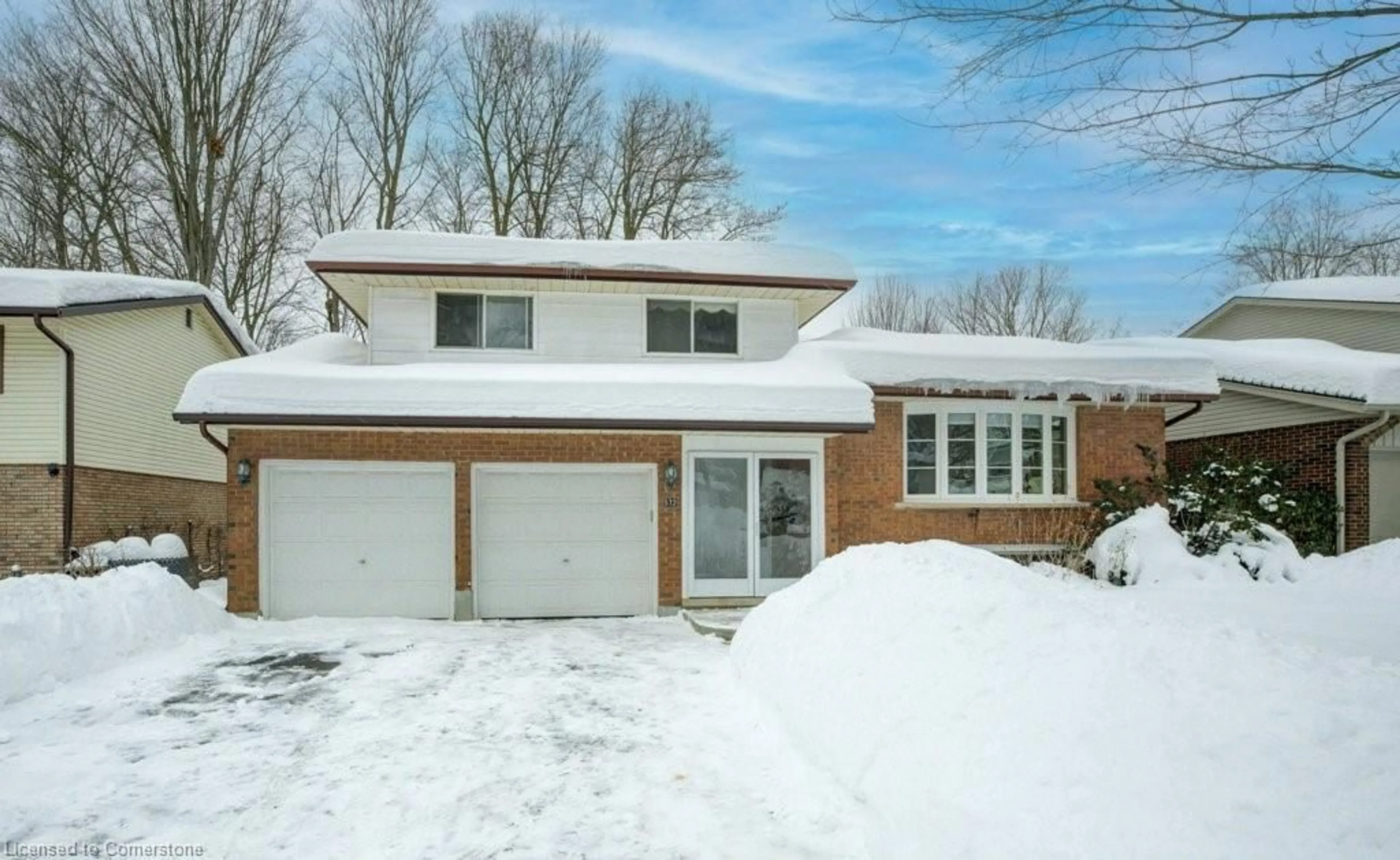 Home with brick exterior material, street for 572 Canewood Cres, Waterloo Ontario N2L 5P6