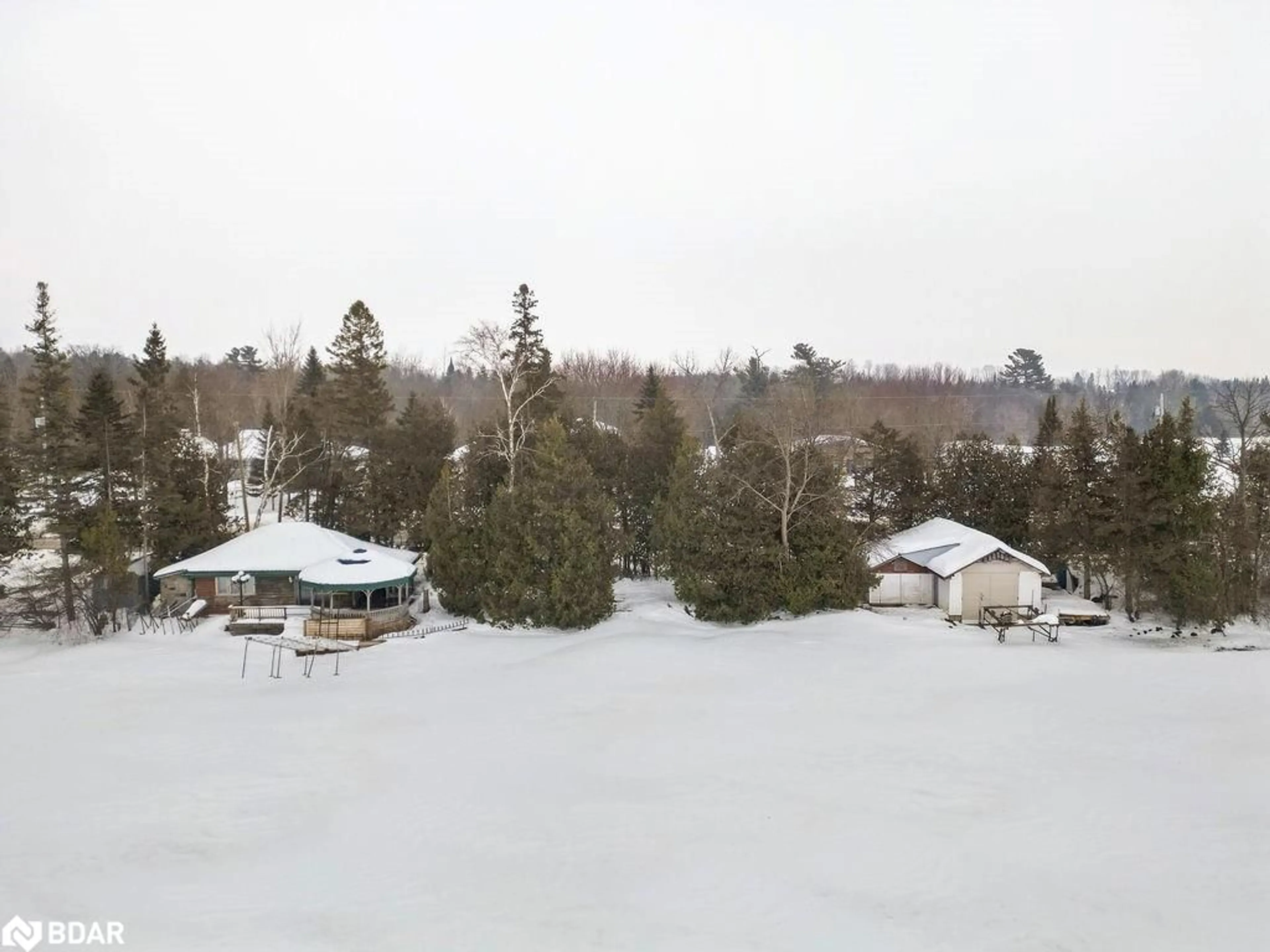 A pic from outside/outdoor area/front of a property/back of a property/a pic from drone, water/lake/river/ocean view for 324 County Road 24, Bobcaygeon Ontario K0M 1A0