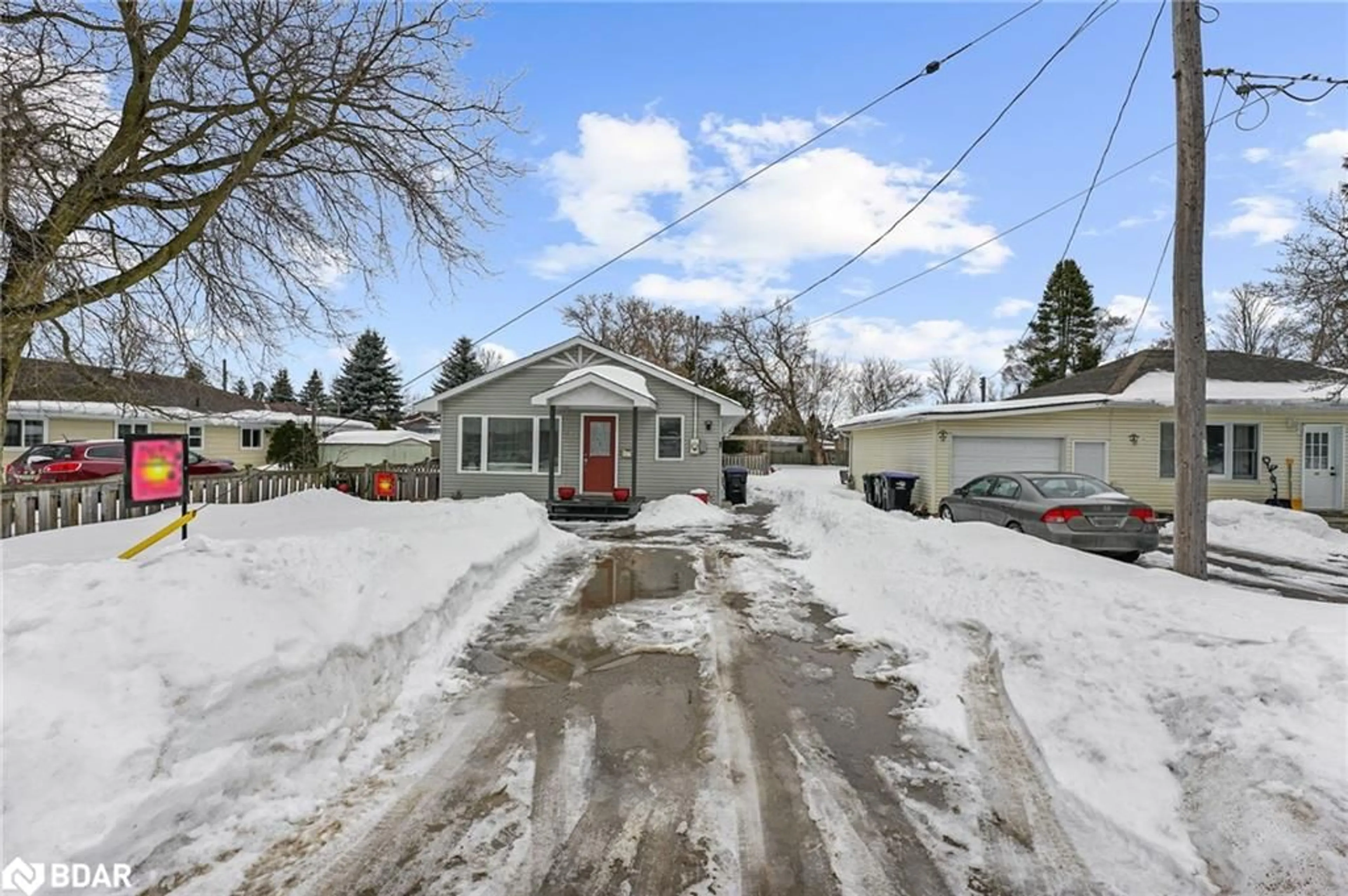 A pic from outside/outdoor area/front of a property/back of a property/a pic from drone, street for 107 Sydenham St, Angus Ontario L0M 1B0