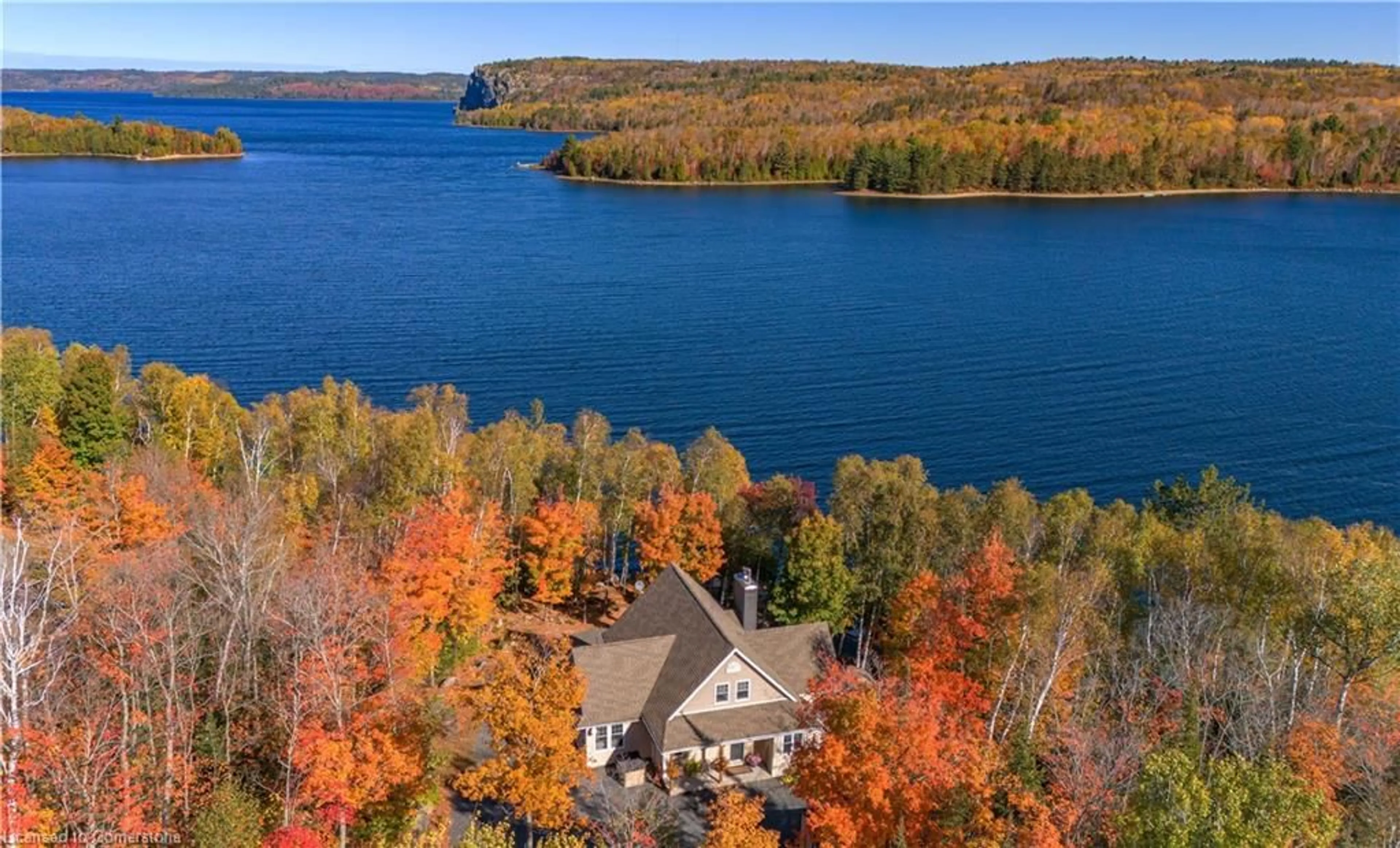 A pic from outside/outdoor area/front of a property/back of a property/a pic from drone, water/lake/river/ocean view for 780 Stanrock Rd, Elliot Lake Ontario P5A 2S9