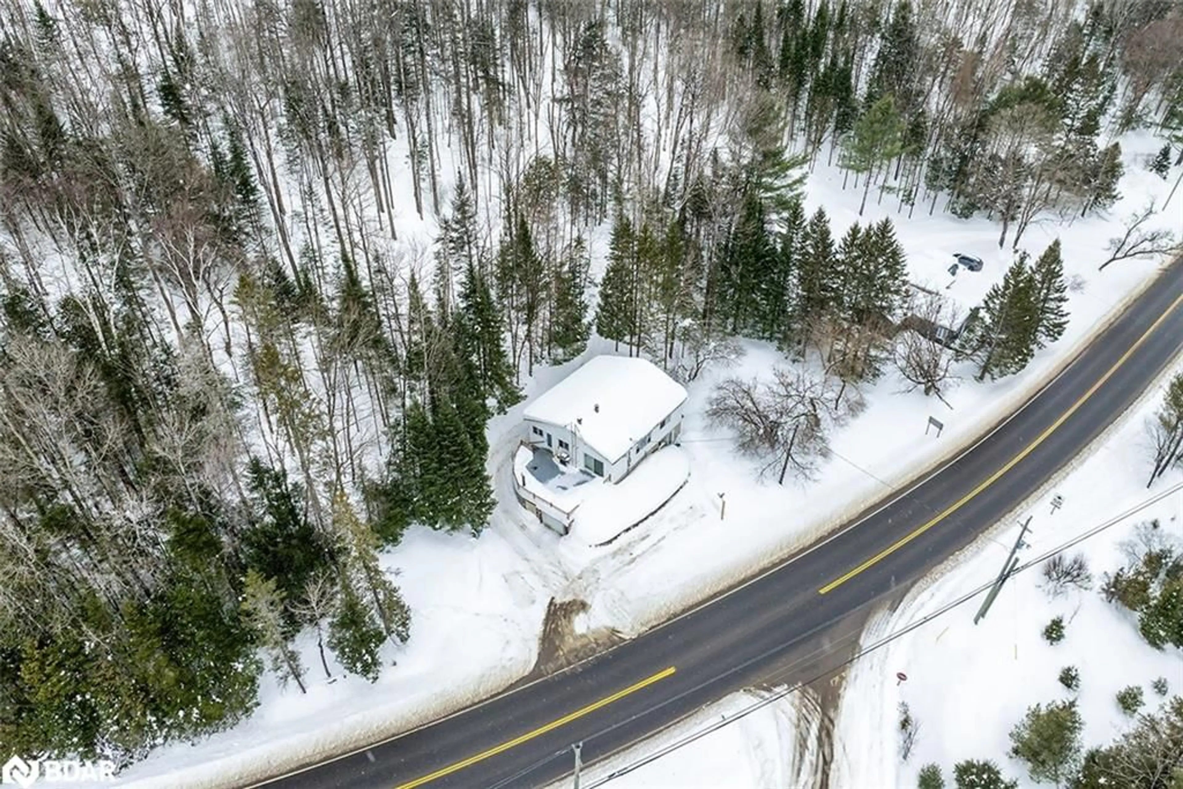 A pic from outside/outdoor area/front of a property/back of a property/a pic from drone, street for 14202 118 Hwy, Dysart Ontario K0M 1S0