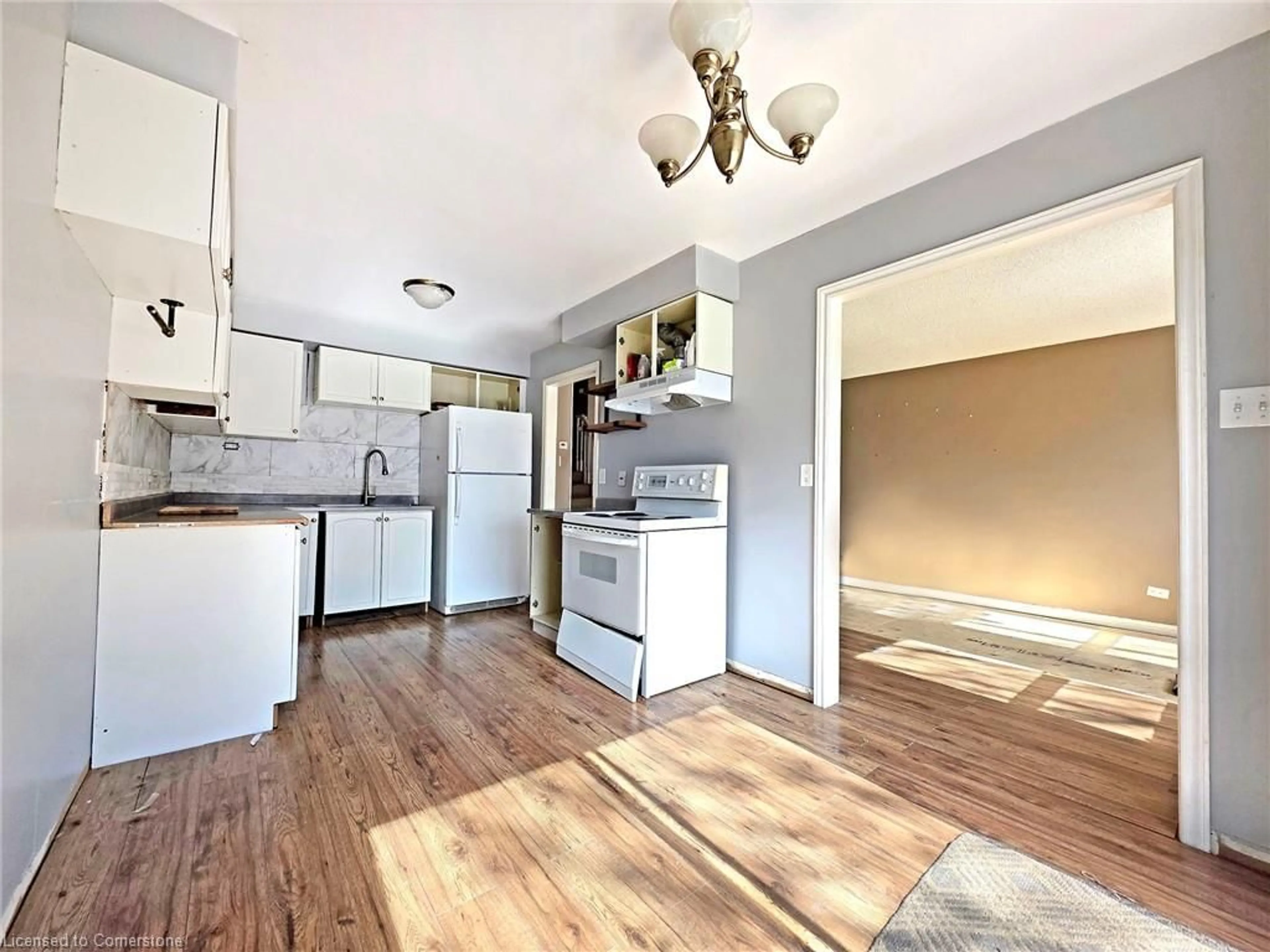 Open concept kitchen, wood/laminate floor for 375 Holiday Inn Dr #33, Cambridge Ontario N3C 3P6