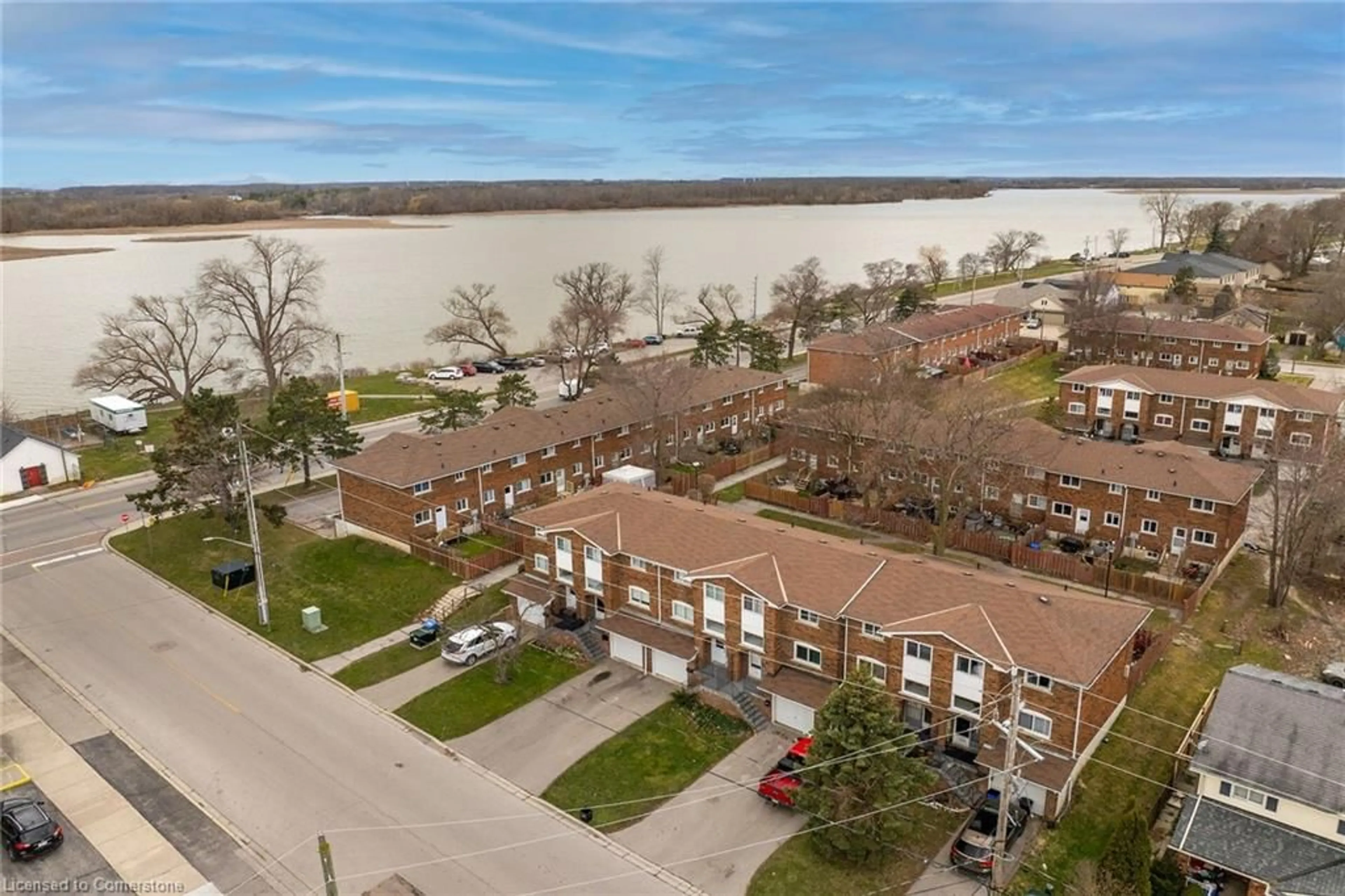 A pic from outside/outdoor area/front of a property/back of a property/a pic from drone, water/lake/river/ocean view for 114 Cedar St #42, Dunnville Ontario N1A 3C7