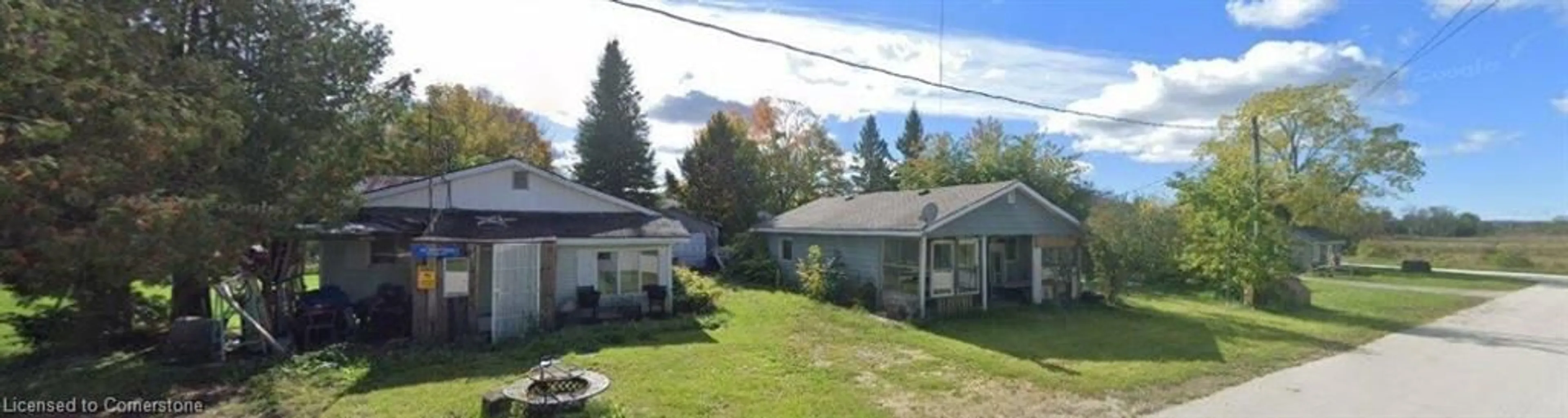 A pic from outside/outdoor area/front of a property/back of a property/a pic from drone, mountain view for 97-101 Division St, Bruce Ontario N0H 2T0