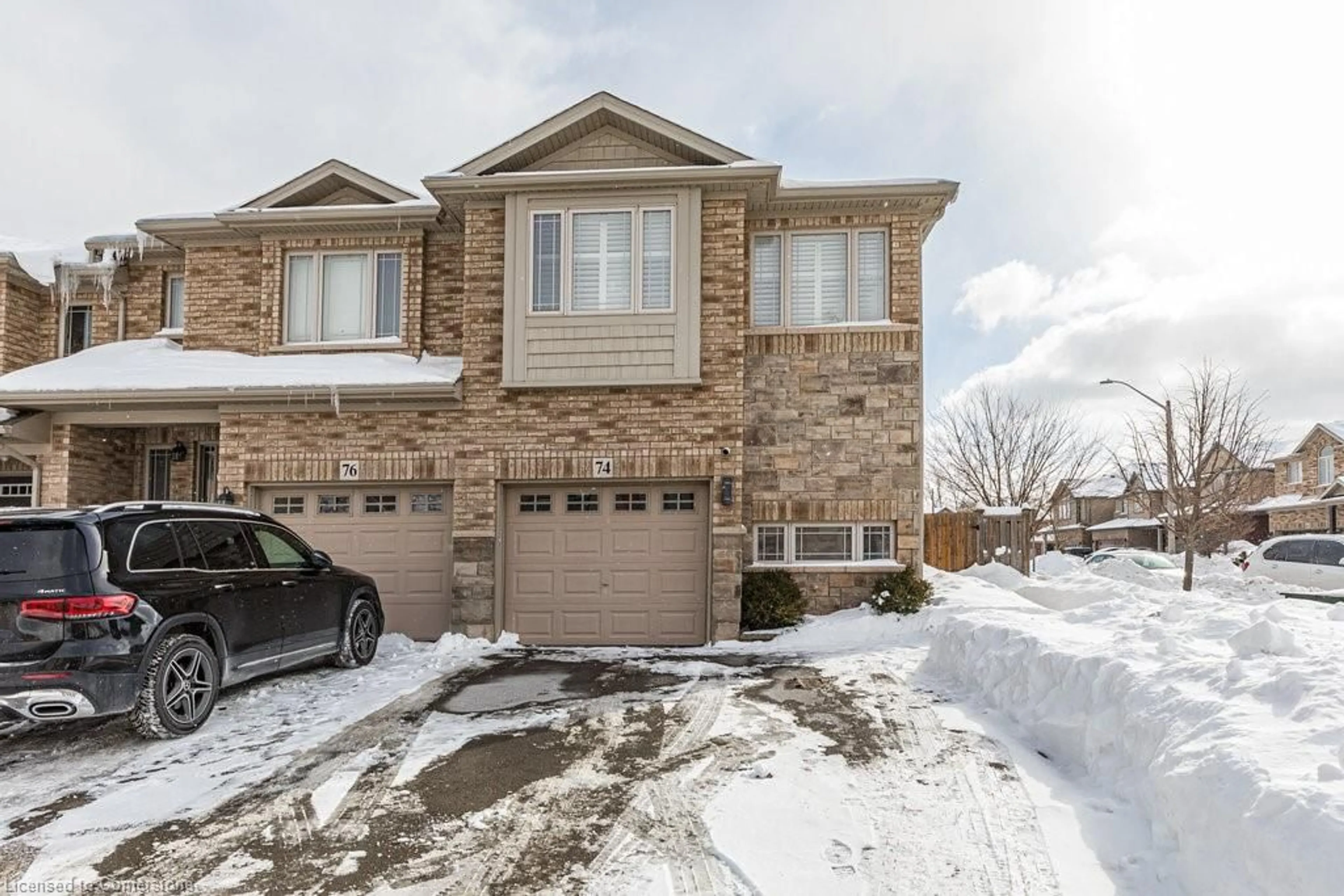 Home with brick exterior material, street for 74 Edenrock Dr, Stoney Creek Ontario L8E 0G7